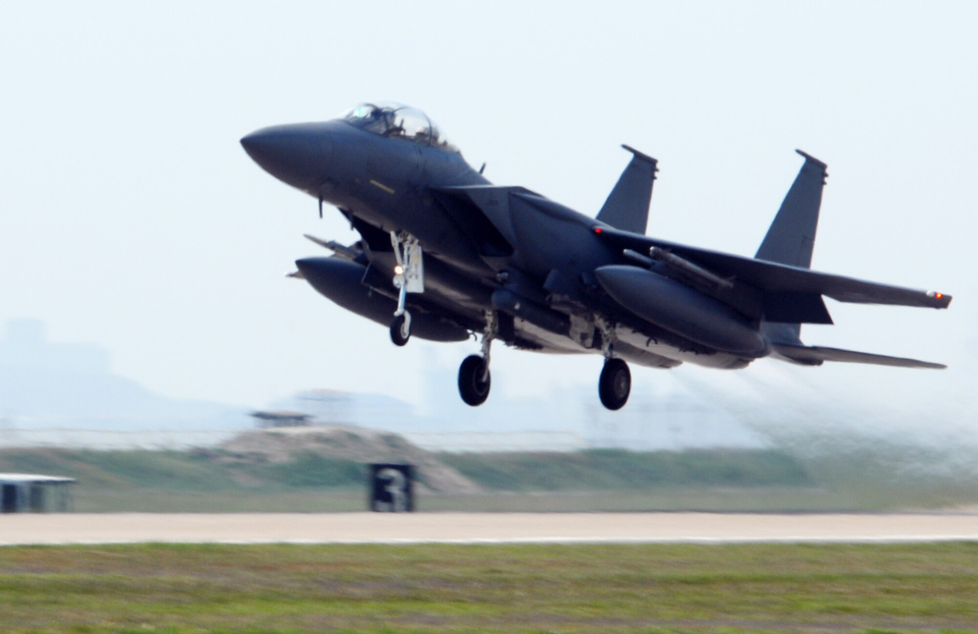 A Republic of Korea Air Force F-15K Slam Eagle takes off from Kunsan Air Base, Republic of Korea, May 11 for a training mission during exercise Max Thunder 09-01. The exercise is a 7th Air Force-designed, bilateral training opportunity that aims to test aircrews' warfighting skills in realistic combat situations that combine both ROKAF and U.S. Air Force flying and maintenance personnel. (U.S. Air Force photo/Senior Airman Gustavo Gonzalez)