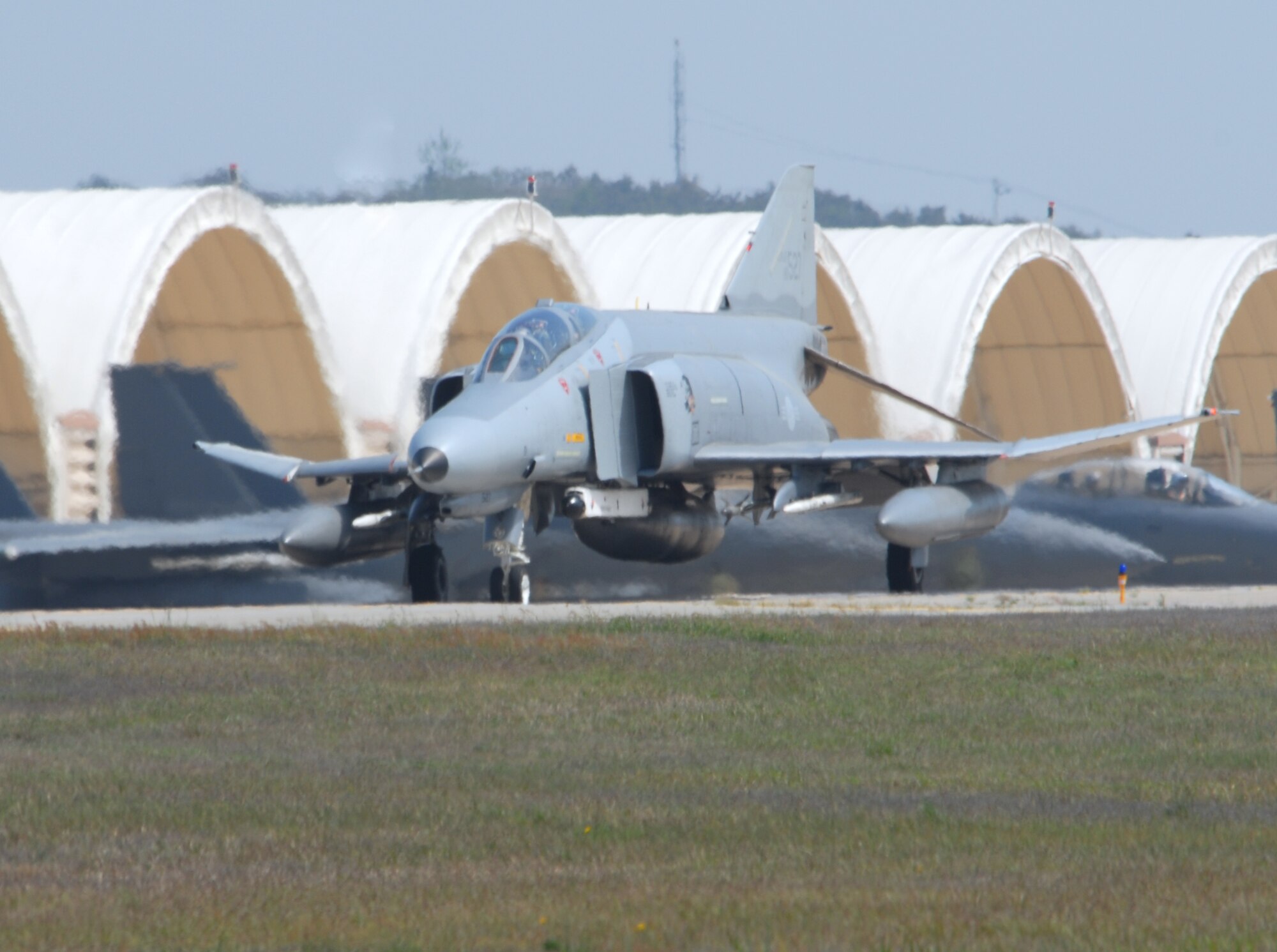 A Republic of Korea Air Force F-4E Phantom taxis to the runway at Kunsan Air Base, Republic of Korea, for a mission May 11 during exercise Max Thunder 09-01. The exercise is a 7th Air Force-designed, bilateral training opportunity that aims to test aircrews' warfighting skills in realistic combat situations that combine both ROKAF and U.S. Air Force flying and maintenance personnel. (U.S. Air Force photo/Senior Airman Gustavo Gonzalez) 