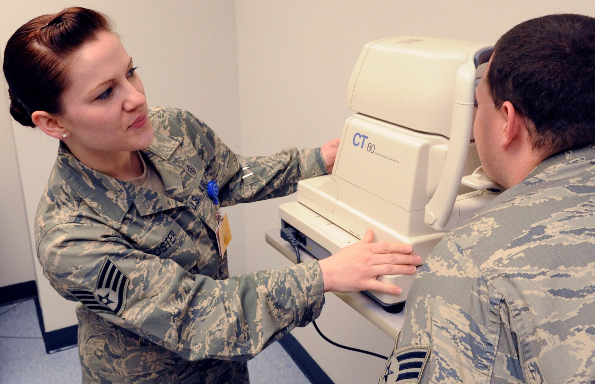 Now that the 87th Medical Group has consolidated the annual Preventive Health Assessment into a one-shop stop, Staff Sgt. Heather Foster, the unit's NCOIC, can administer a glaucoma test, which could previously only be done in Optometry. This is one example of the ever-expanding role of military medical technicians and nurses.
(U.S. Air Force photo/Wayne Russell)