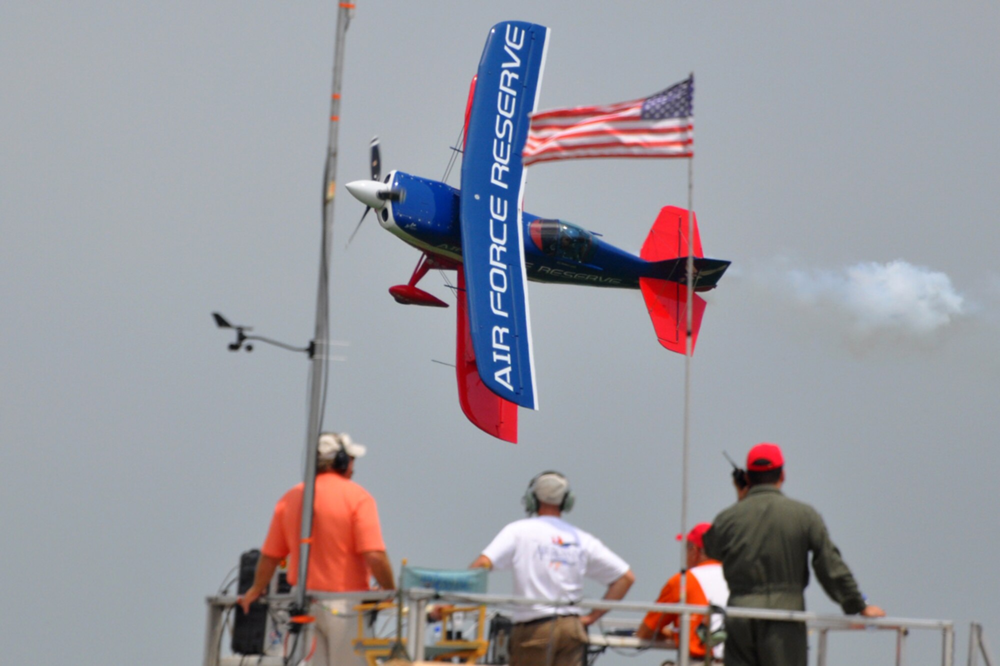 Ed Hamill maneuvers his Air Force Reserve biplane for a photo pass for the crowd of thousands during the Defenders of Liberty Air Show 2009, at Barksdale Air Force Base, La., May 9. Ed combines the history of airshow flying and the Air Force Reserve with his message: set goals, work hard and never give up. (US Air Force photo/Tech. Sgt. Jeff Walston)