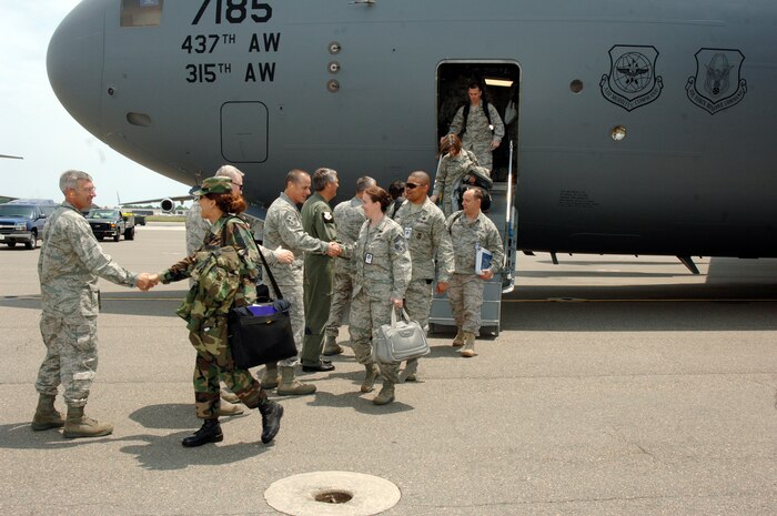 The Inspector General team received a warm welcome from members of team Charleston on the flightline here May 11. More than 85 inspectors arrived at Charleston AFB to conduct a unit compliance inspection to ensure the base is mission ready. (U.S. Air Force photo/Staff Sgt. Marie Cassetty)