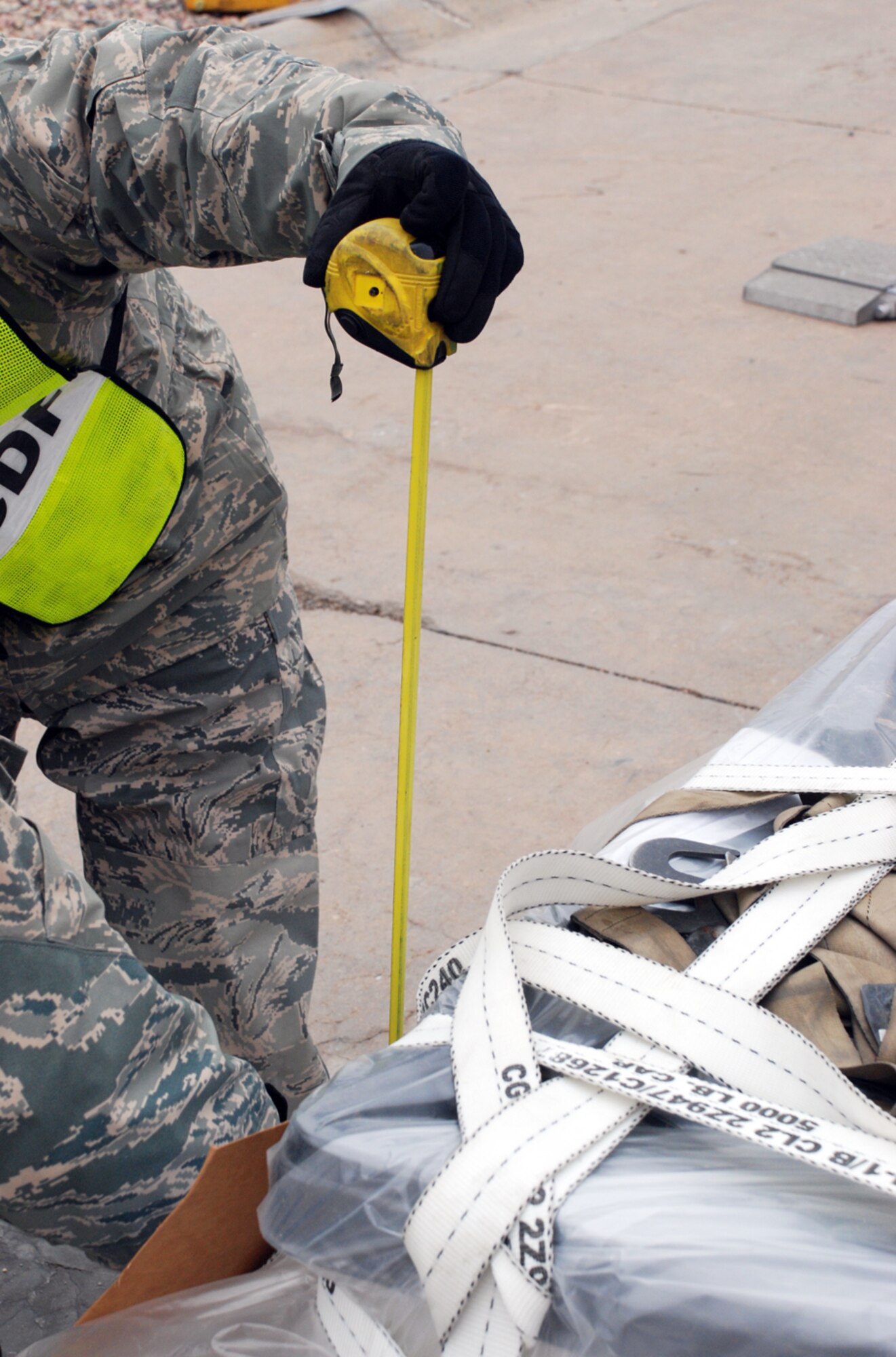 The pallet's height is also measured in the inchecking area. Height is important depending on the aircraft the cargo will be shipped on. For example, the overall height clearance of a C-17 Globemaster III is greater than a C-130 Hercules.