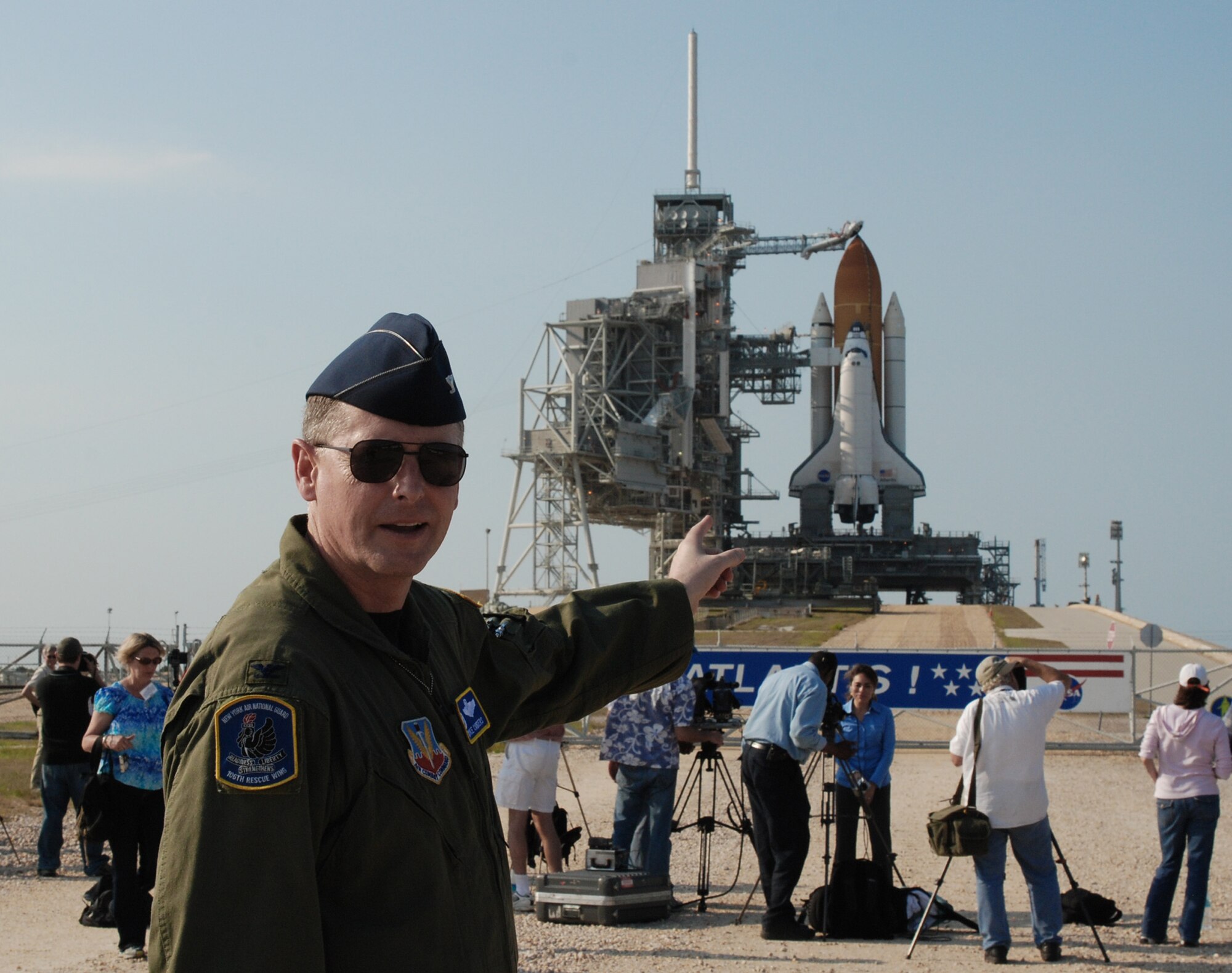 Col. Michael Canders explains how NASA astronauts would bail out of Space Shuttle Atlantis May 10 at Kennedy Space Center, Fla. The shuttle launched successfully May 11. (U.S. Air Force photo/Master Sgt. Corine Lombardo) 
