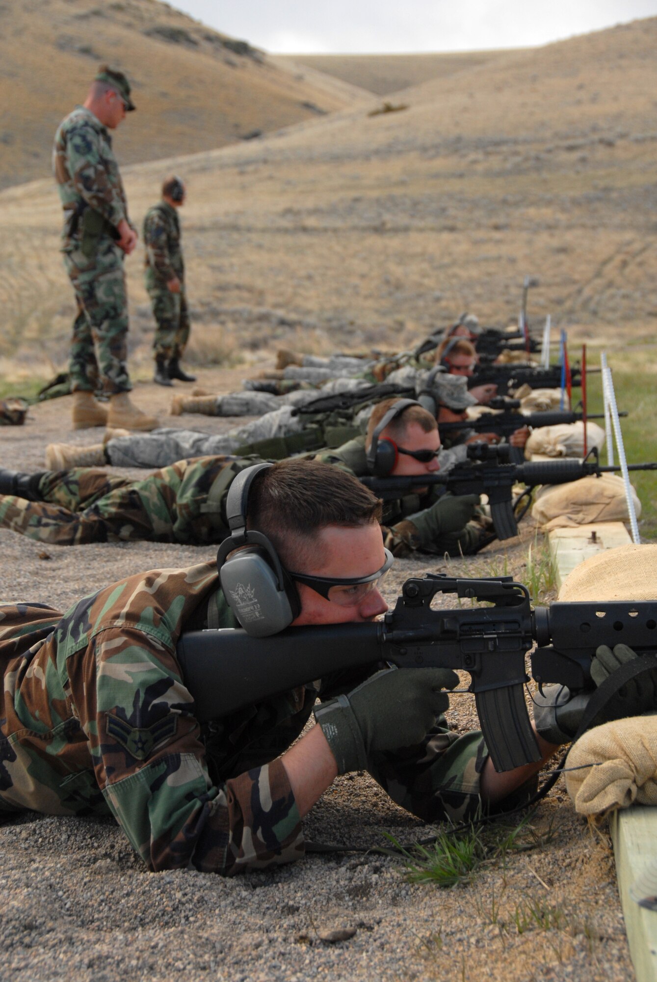 Members of the 185th Air Refueling Wing, Security Forces from Sioux City, Iowa, fire the M-4 Carbine at Fort Harrison, Montana, on 11 May, 2009.  (U.S. Air Force photo by TSgt. Brian Cox)