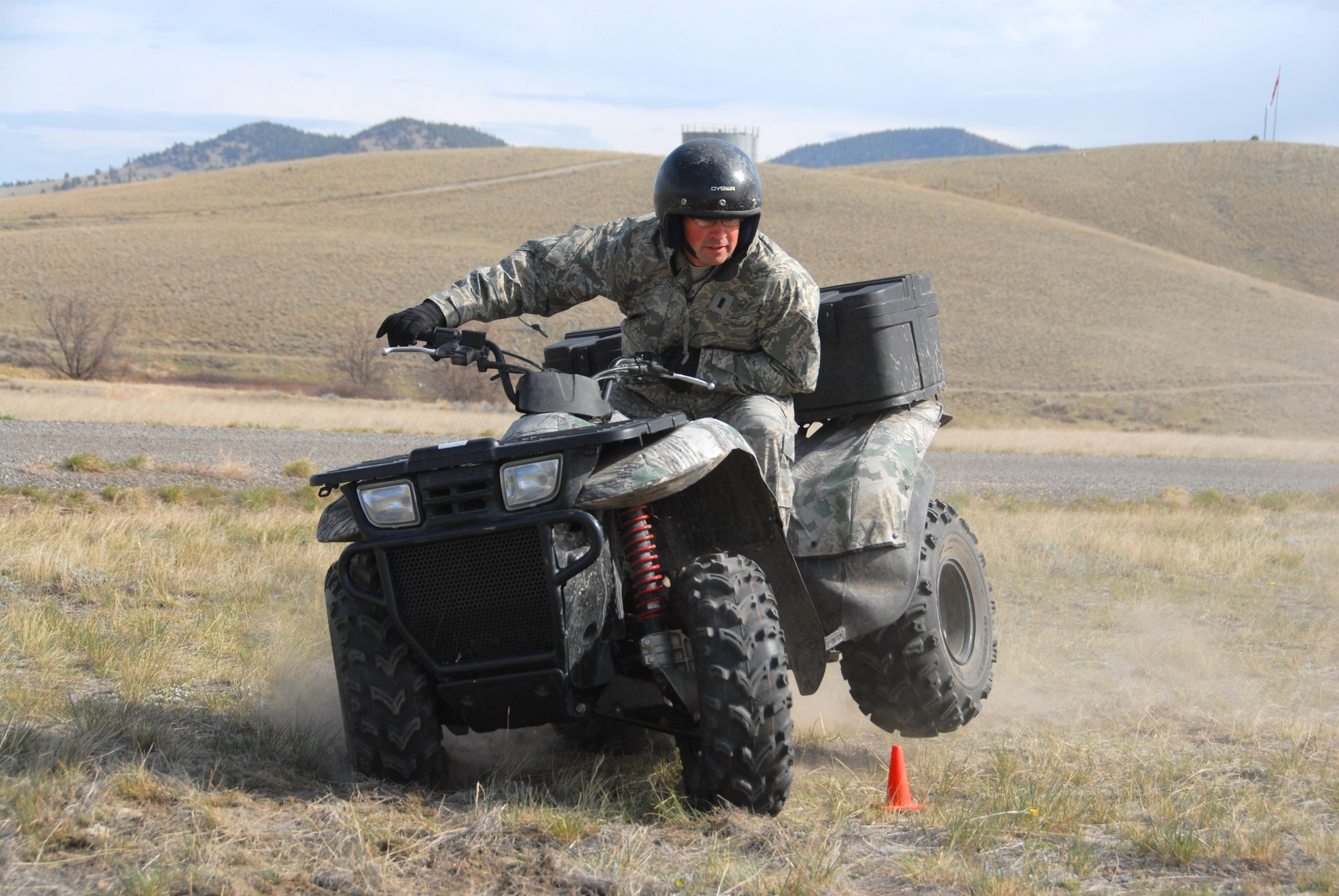 Members of the 185th Air Refueling Wing, Security Forces from Sioux City, Iowa, train on All Terrain Vehicles (ATVs) at Fort Harrison, Montana, on 11 May, 2009.  Security Forces utilize ATVs for off-road tracking, training and enforcement. (U.S. Air Force photo by TSgt. Brian Cox)