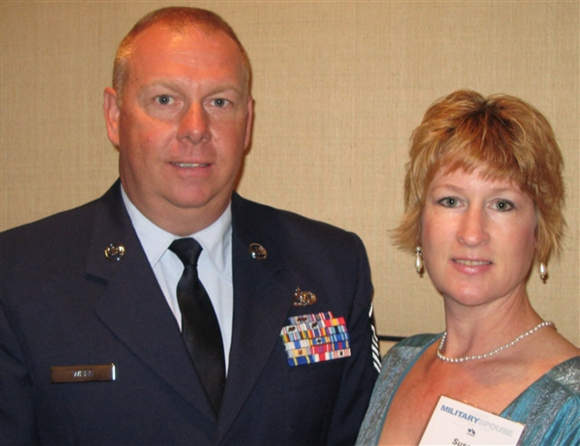 Susan P. Webb, right, and her husband, Air National Guard Master Sgt. Ken Webb, pose for a photograph at the 2009 Military Spouse of the Year awards ceremony in Washington, D.C., May 7, 2009. (DoD photo by Gerry J. Gilmore)