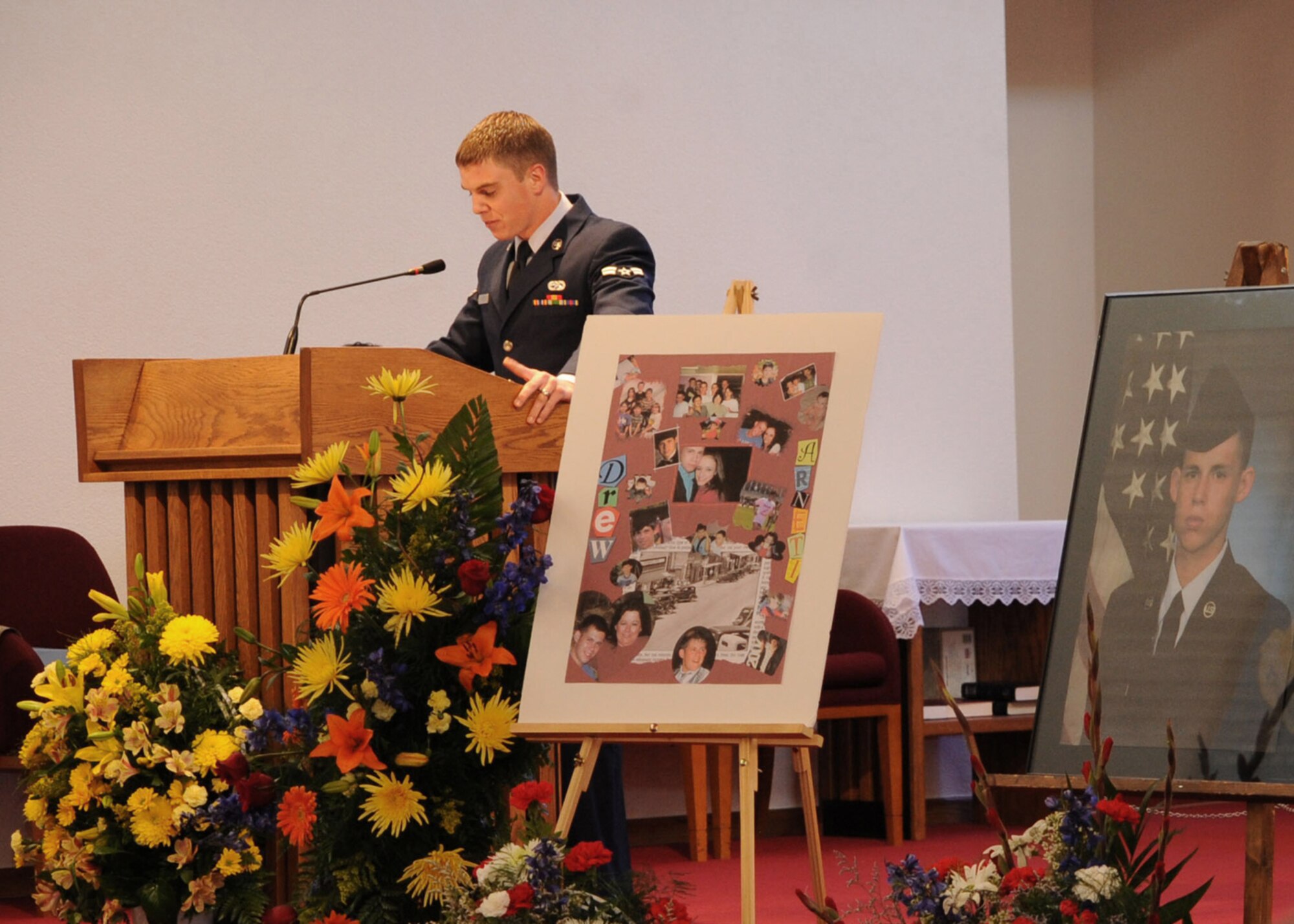 CANNON AIR FORCE BASE, N.M.-- Airman 1st Class Michael Arndt, 27th Special Operations Aircraft Maintenance Squadron, speaks during the memorial service for Airman 1st Class Andrew Arnett May 6. Airman Arnett, who was also assigned to 27 SOAMXS, was killed in an automobile accident on April 23 in Weatherford, Okla . (U.S. Air Force photo by Airman Maynelinne De La Cruz)