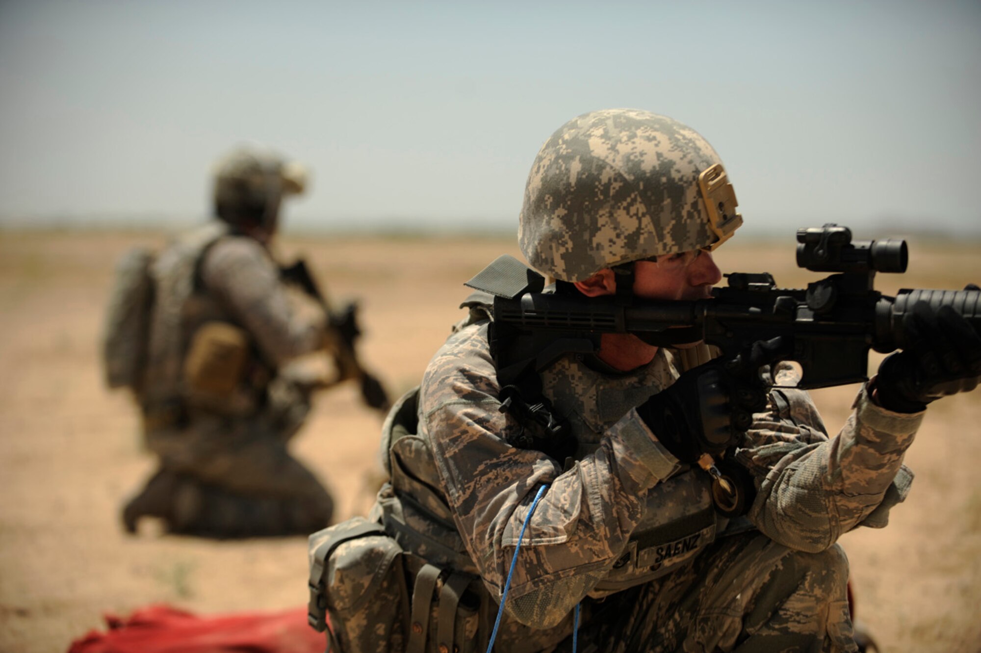 KANDAHAR AIR FIELD, Afghanistan -- Staff Sgt.Scott Saenz, a 755th Explosive Ordinance Disposal technician, conducts security during joint explosive ordinance training at Kandahar Airfield, Afghanistan, on May 5, 2009, in support of Operation Enduring Freedom.  (U.S. Air Force photo by Staff Sgt. James L. Harper Jr.) Released