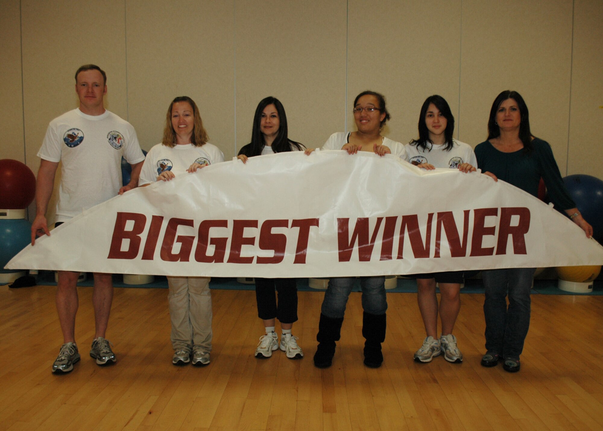 The third annual "Biggest Winner" contest concluded here April 26, 2009, with an award ceremony at the 31st Force Support Squadron Dragon Fitness Center.  Aaron LeBleu took first place in the men's division; Andrea Smith took first place in the women's division and 'Team No Name?' consisting of Carmen Colon and her daughter Gabriela Colon and Carmen Gatson and her daughter Jonece Tallant, took first place in the team division. Overall, the 77 finishers of the 90-day program dropped a combined 690 pounds.  (U.S. Air Force photo/Tech. Sgt. Michael O'Connor)