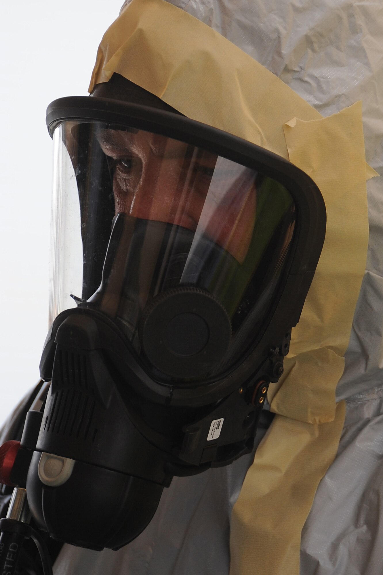 Master Sgt. Jason Golden, 380th Expeditionary Civil Engineer Squadron, stands ready in his level-B hazmat suit prior to the start of hazmat decontamination training, May 2 at an undisclosed location in Southwest Asia. The 380th ECES Readiness and Emergency Management Flight, conducted hazmat decontamination training to keep their proficiency skills sharp and ready for real world. Sergeant Golden is deployed from Andres AFB, Md. and hails from Wolf Creek, Mont. (U.S. Air Force photo by Senior Airman Brian J. Ellis) (Released)
