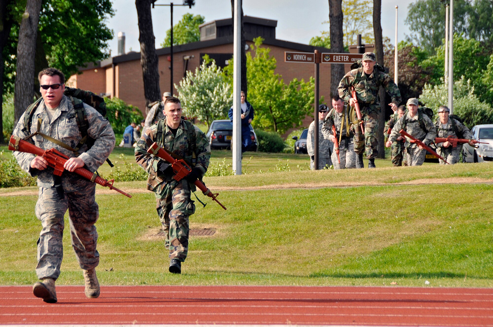 ROYAL AIR FORCE LAKENHEATH, England -- Airmen move to the litter carry checkpoint during the 5K Ruck March May 11, 2009. The litter carry was the last obstacle during the 5K Ruck March apart of The National Police Week.  (U.S. Air Force photo by Airman 1st Class Perry Aston)
