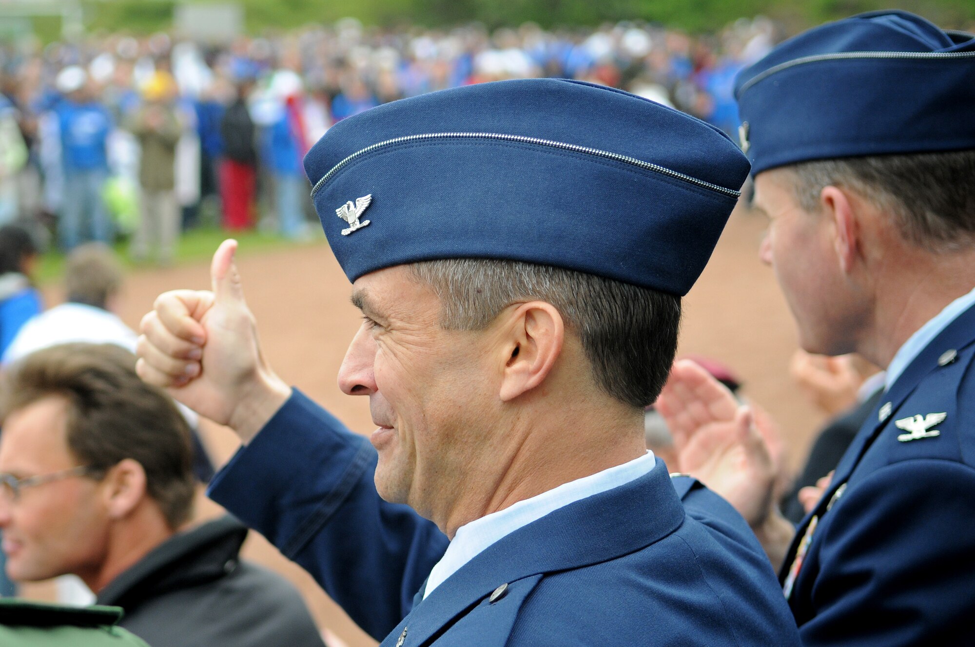 United States Air Force Col. Don Bacon, 435th Air Base Wing commander, gives a thumbs up to all the athletes during the opening parade at the 36th Annual Special Olympics held in Enkenbach-Alsenborn, Germany, May 6, 2009. Special Olympics is an international program of year-round sports training and athletic competition for more than 1.7 million children and adults with disabilities in more than 150 countries including Germany. (U.S. Air Force photo by Airman 1st Class Grovert Fuentes-Contreras)(Released)