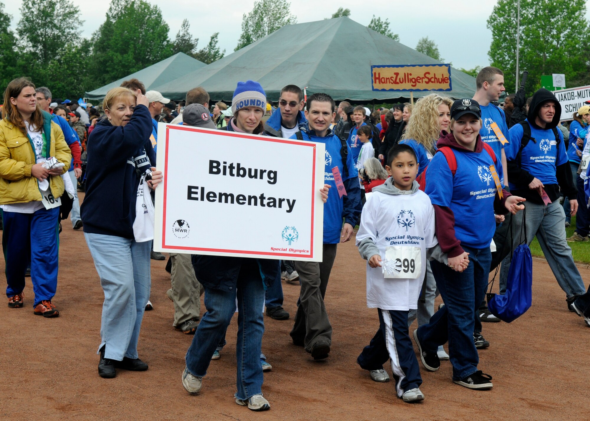KAISERSLAUTERN, Germany – Athletes from the Bitburg Elementary School and their buddies participate in the open ceremonies parade as part of the U.S. Army Garrison Kaiserslautern Special Olympics Spring Games at the Police Academy in Enkenbach-Alsenborn May 6, 2008. (U.S. Air Force photo by Airman 1st Class Staci Miller)