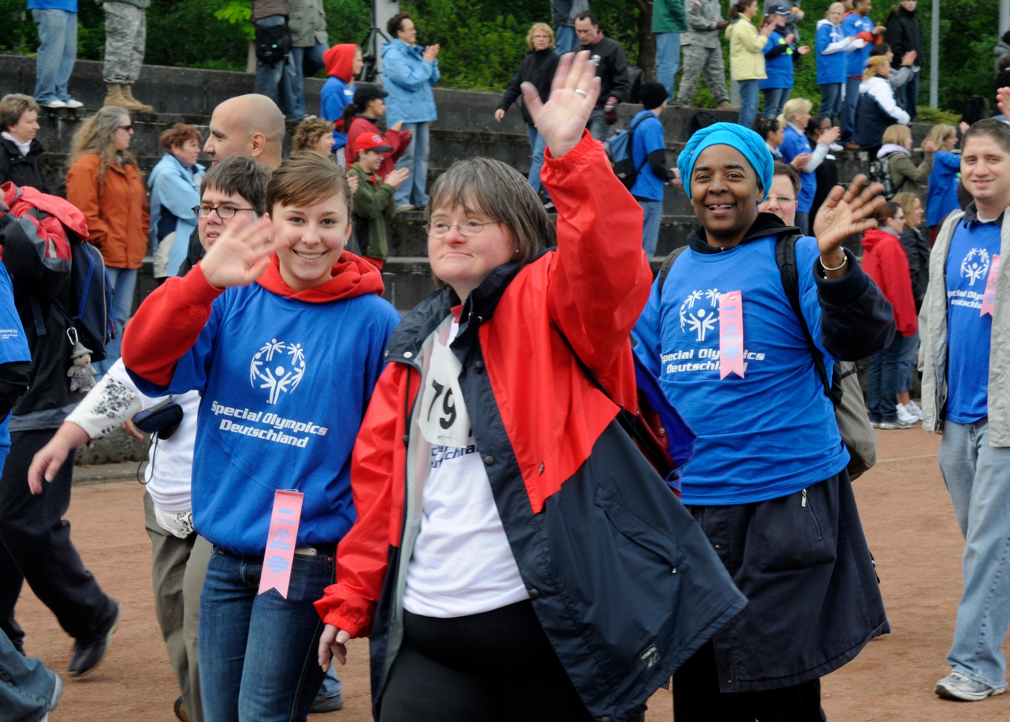 KAISERSLAUTERN, Germany – Airman Lesley Ackley, 726th Air Mobility Squadron, walks with her buddy during opening ceremonies parade at the U.S. Army Garrison Kaiserslautern Special Olympics Spring Games at the Police Academy in Enkenbach-Alsenborn May 6, 2008. (U.S. Air Force photo by Airman 1st Class Staci Miller)