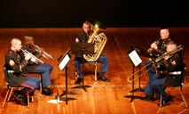 A brass quintet with the Twentynine Palms Band performs for a music class from Roberto Clemente High School on Chicago's West Side May 12. The performance was one of several throughout the Chicagoland area as part of the inaugural Marine Week Chicago, which runs from May 11-17. The weeklong event provides an opportunity for Chicago citizens to meet the men and women of the Marine Corps and learn about its history, traditions and value to the nation.
