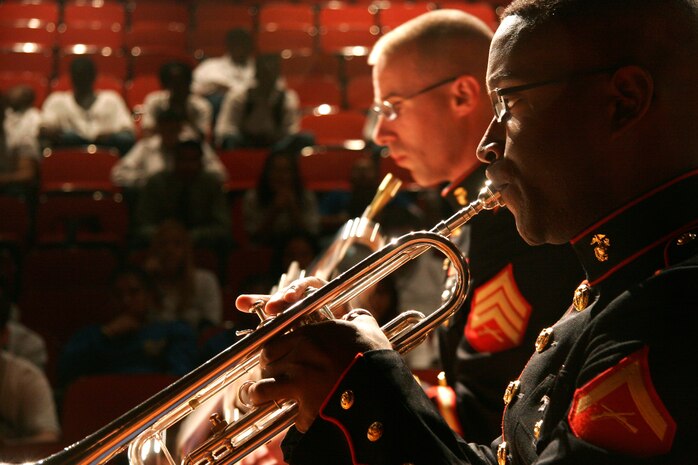 Lance Cpl. David Phillips performs for the students of Roberto Clemente High School during a music performance here today. Phillips, a 19-year-old trumpet player with the Twentynine Palms Marine Band, shared information about opportunities in the Marine Corps as a musician with the students from the high school in Chicago's West Side. The performance was one of several throughout the Chicagoland area as part of the inaugural Marine Week Chicago, which runs through Sunday.  The weeklong event provides an opportunity for Chicago citizens to meet the men and women of the Marine Corps and learn about its history, traditions and value to the nation.