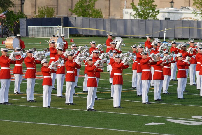 'The Commandant's Own' perform for spectators at Oak Park Forest River High School May 12, during Marine Week 2009. More than 2,000 Marines came to Chicago offering its citizens the opportunity to get to know the men and women of the Corps and learn about its history, traditions and value to the nation.
