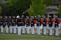 The Silent Drill Platoon performs for spectators at Oak Park Forest River High School May 12, during Marine Week 2009. More than 2,000 Marines came to Chicago offering its citizens the opportunity to get to know the men and women of the Corps and learn about its history, traditions and value to the nation.