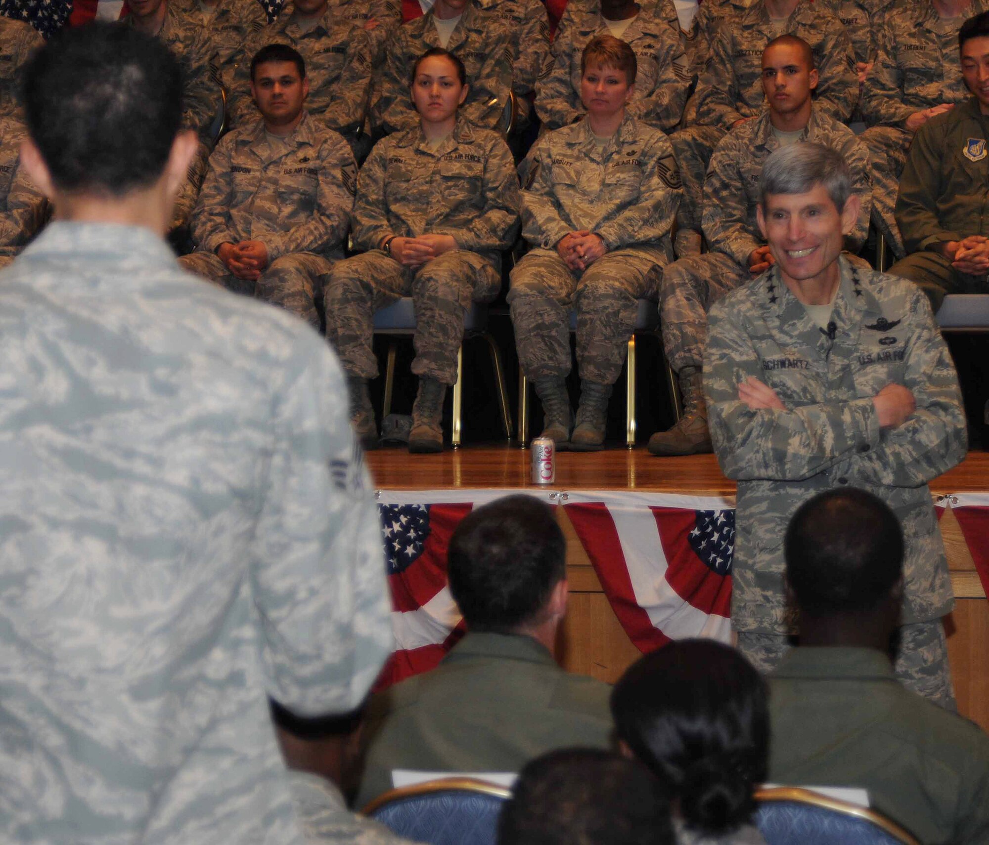 YOKOTA AIR BASE, Japan -- General Norton Schwartz, Air Force chief of staff, listens as a Team Yokota Airman asks a question during his Airman's Call at the Taiyo Community Center May 13. The general spoke about his priorities as the top ranking Airman and fielded questions ranging from changes to the Air Force fitness program to the service's efforts to go "green".(U.S. Air Force photo/Airman 1st Class Devin Doskey)