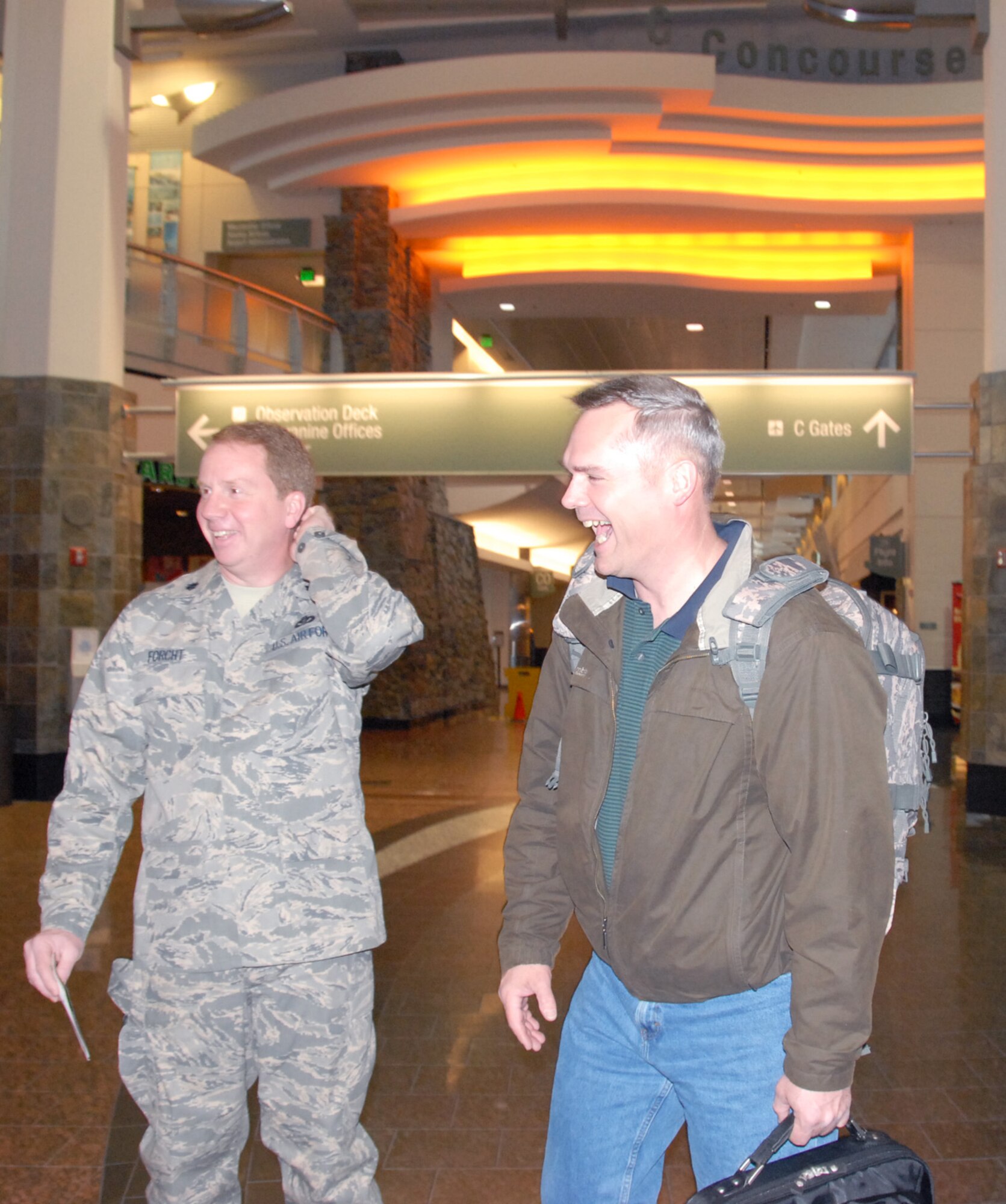 ELMENDORF AIR FORCE BASE, Alaska – Lt. Col. Michael Forcht, 477th Civil Engineer Squadron commander, shared a laugh with Chief Master Sgt. Michael Davis, Air Force Reserve Command’s 477th Fighter Group, before Chief Davis departed for Kirkuk, Iraq, May 4. Chief Davis previously served as the first sergeant for the 477th FG, and is currently serving as the chief enlisted manager for the 506th Air Expeditionary Group. (U.S. Air Force photo/Staff Sgt. Andrea Knudson)