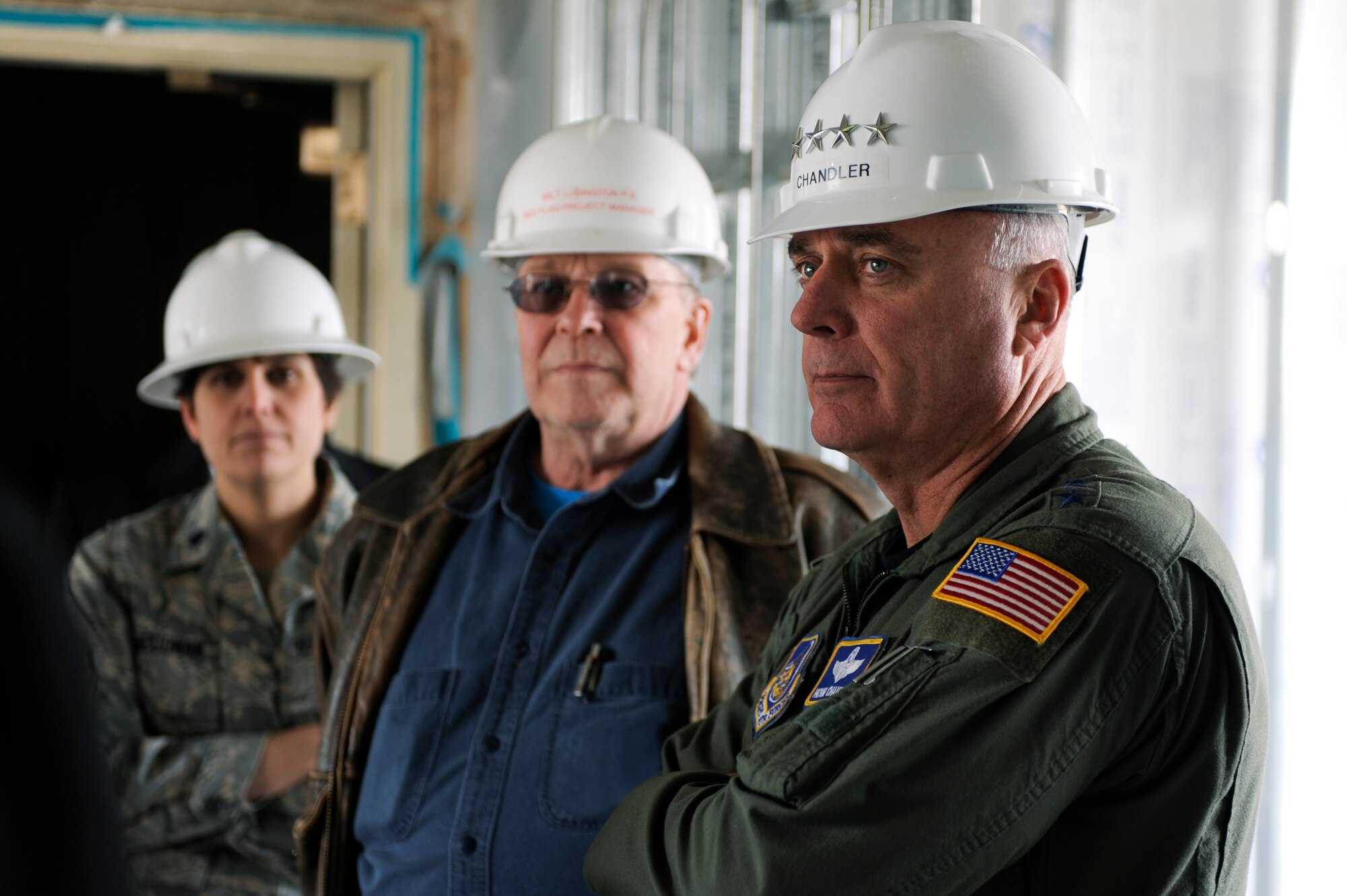 Gen. Carrol H. "Howie" Chandler, Pacific Air Forces commander, receives a tour of a building currently undergoing renovation May 12, 2009, Eielson Air Force Base, Alaska. During General Chandlers' visit he had a chance to see current infrastructure progress and future construction plans for quality of life improvements.  (U.S. Air Force Photo/Senior Airman Jonathan Snyder)
