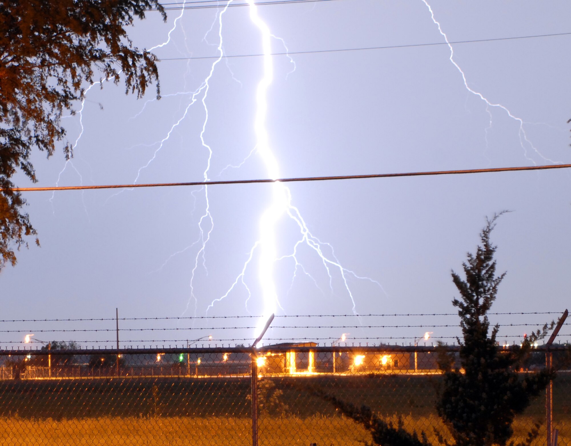 A lightning strike photographed near Vance during a thunderstorm last summer. (Photo by Master Sgt. Gary Rann)