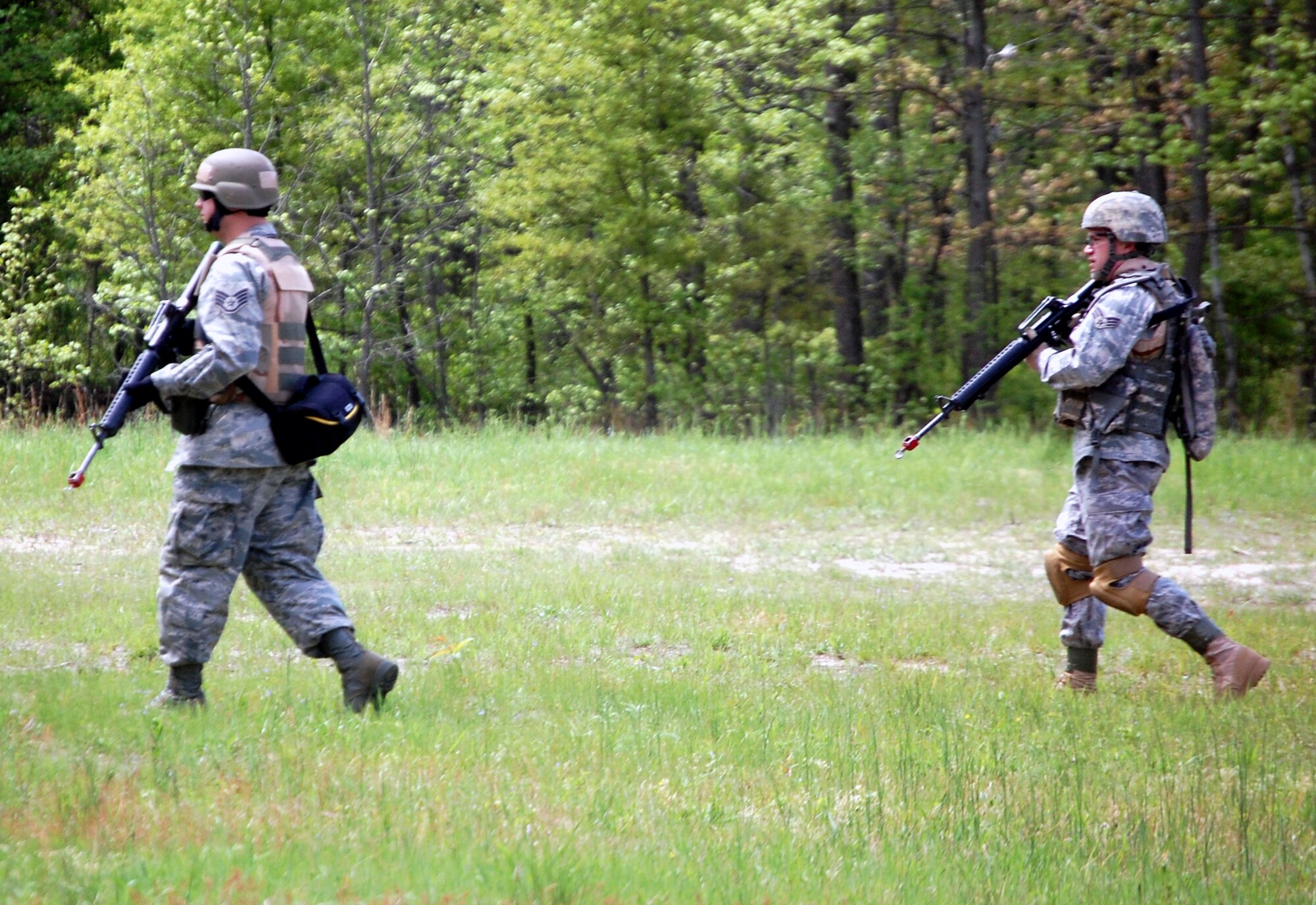 Students in the Advanced Contingency Skills Training Course walk in a patrol formation during training on a Fort Dix, N.J., range on May 11, 2009.  The training, taught by the U.S. Air Force Expeditionary Center's 421st Combat Training Squadron on Fort Dix, prepares Airmen for upcoming deployments.  (U.S. Air Force Photo/Tech. Sgt. Scott T. Sturkol)