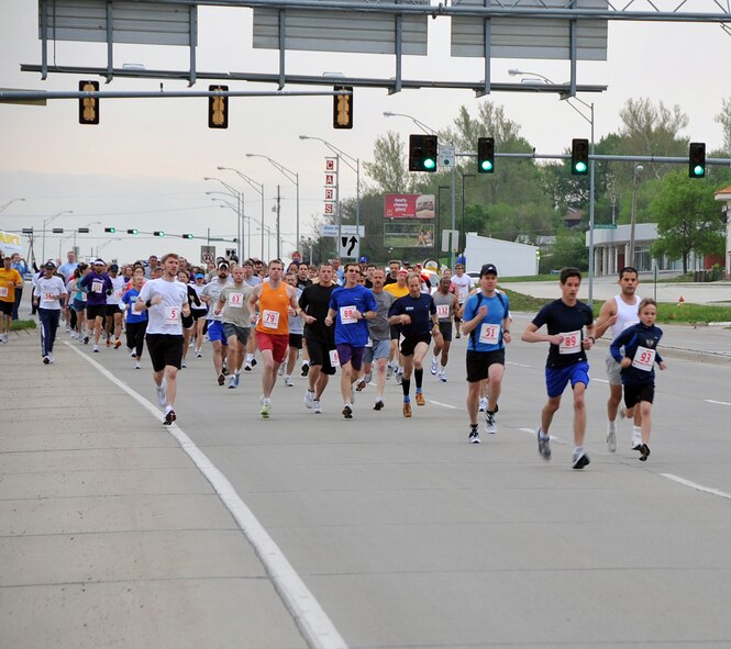 OFFUTT AIR FORCE BASE, Neb. - More than 161 runners begin running on Fort Crook road during the 2nd annual Runway Run in here May 10. The Runway Run is a seven mile race through parts of Bellevue and Offutt AFB.  Air Force Photo by Jeff W. Gates