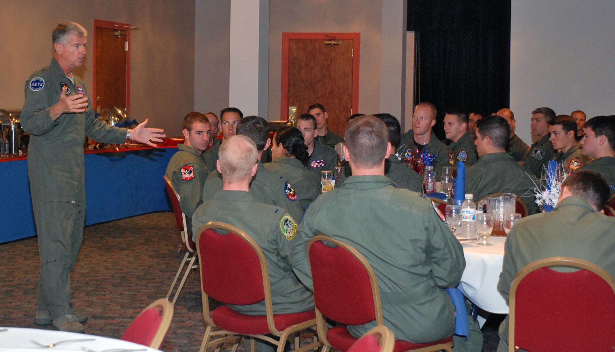 LAUGHLIN AIR FORCE BASE, Texas – Maj. Gen. Anthony Przybyslawski, Air Education and Training Command vice commander, speaks to a group of First Assignment Instructor Pilots during FAIPAPALOOZA here May 9. For the first time in history, Laughlin hosted the Air Education and Training Command event with FAIPs from across the command. It was a weekend–long event that included static displays of an F-16 and PC-12 and instruction from the pilots to help get them acquainted with major weapons systems they might fly in the future. (U.S. Air Force photo by Airman 1st Class Sara Csurilla) 