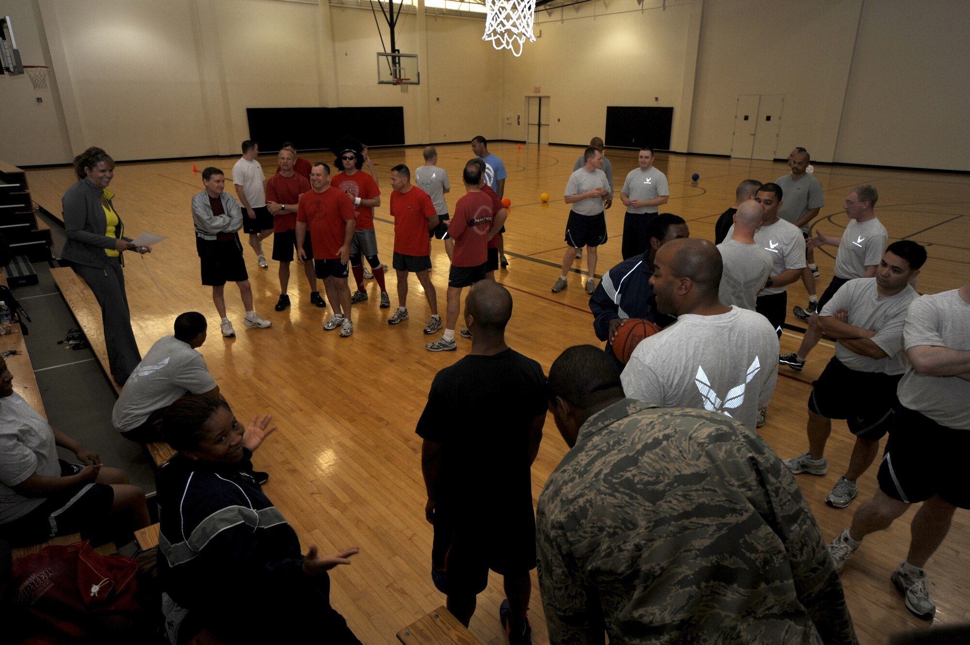 Airmen from the U.S. Air Force Expeditionary Center are reminded of the rules of dodgeball May 8 during the start if the center's dodgeball tournament held at the McGuire Air Force Base, N.J., fitness center. The tournament was part of a fundraising effort for the Expeditionary Center's 15th anniversary committee.   (U.S. Air Force Photo/Staff Sgt. Nathan G. Bevier) 