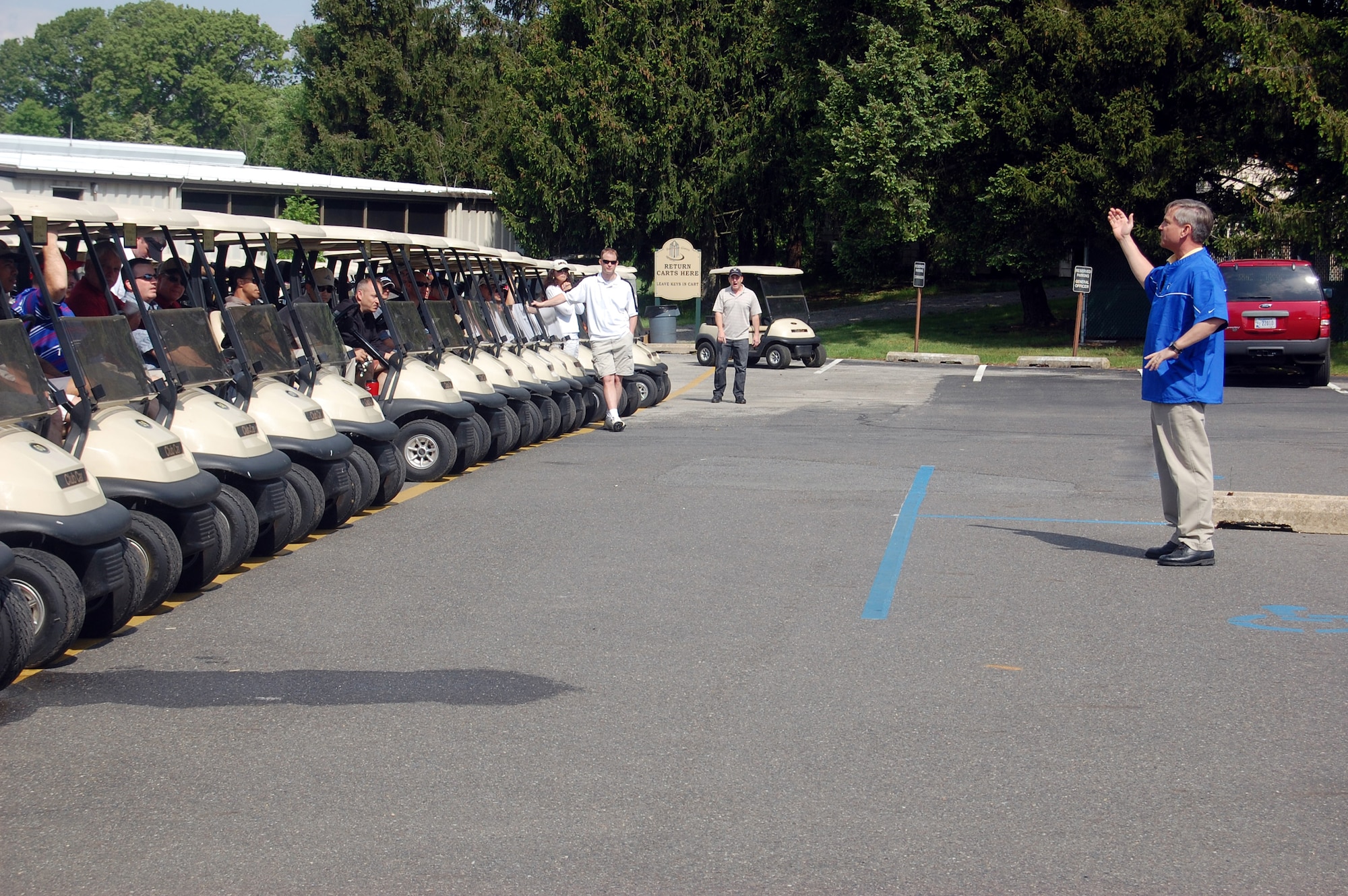 Maj. Gen. Kip Self (right), U.S. Air Force Expeditionary Center commander, gives opening remarks to the teams participating in the 2009 Nick Grand Memorial Golf Tournament on the Fort Dix, N.J., golf course on May 12, 2009.  The tournament is an annual fundraising tournament for the Expeditionary Center's Top Three organization.  (U.S. Air Force Photo/Tech. Sgt. Scott T. Sturkol)
