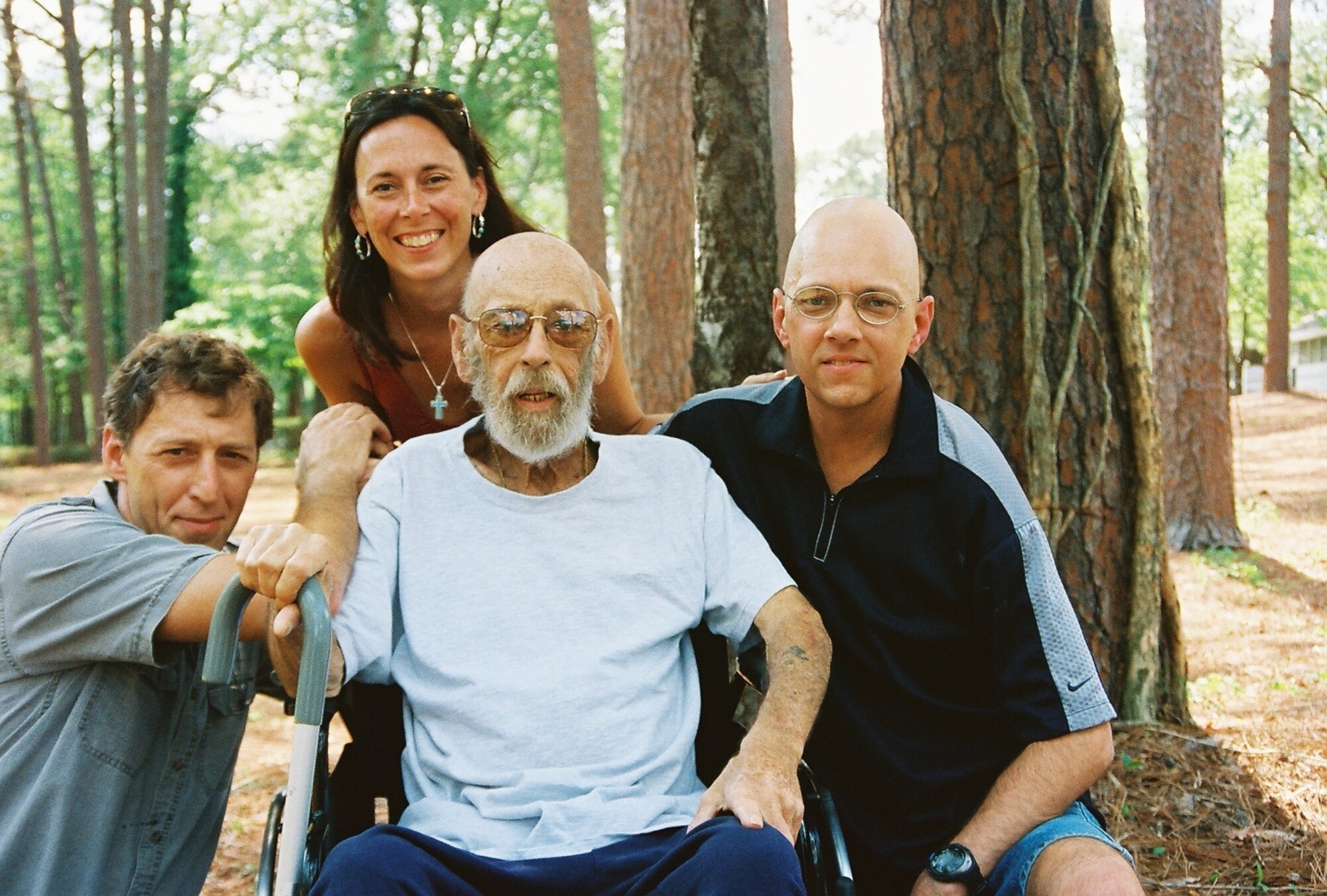 Master Sgt. Mike Sanders (right) with his brother, Tommy (left), sister, Kristi (top center) and their father, Tommy, in this family photo.  Sergeant Sanders’ father was a source of strength for the 18-year Air Force veteran as he fought stage IV cancer.  This photo was taken shortly before Sergeant Sanders’ father passed away from his own battle with cancer. (Photo courtesy Master Sgt. Mike Sanders)