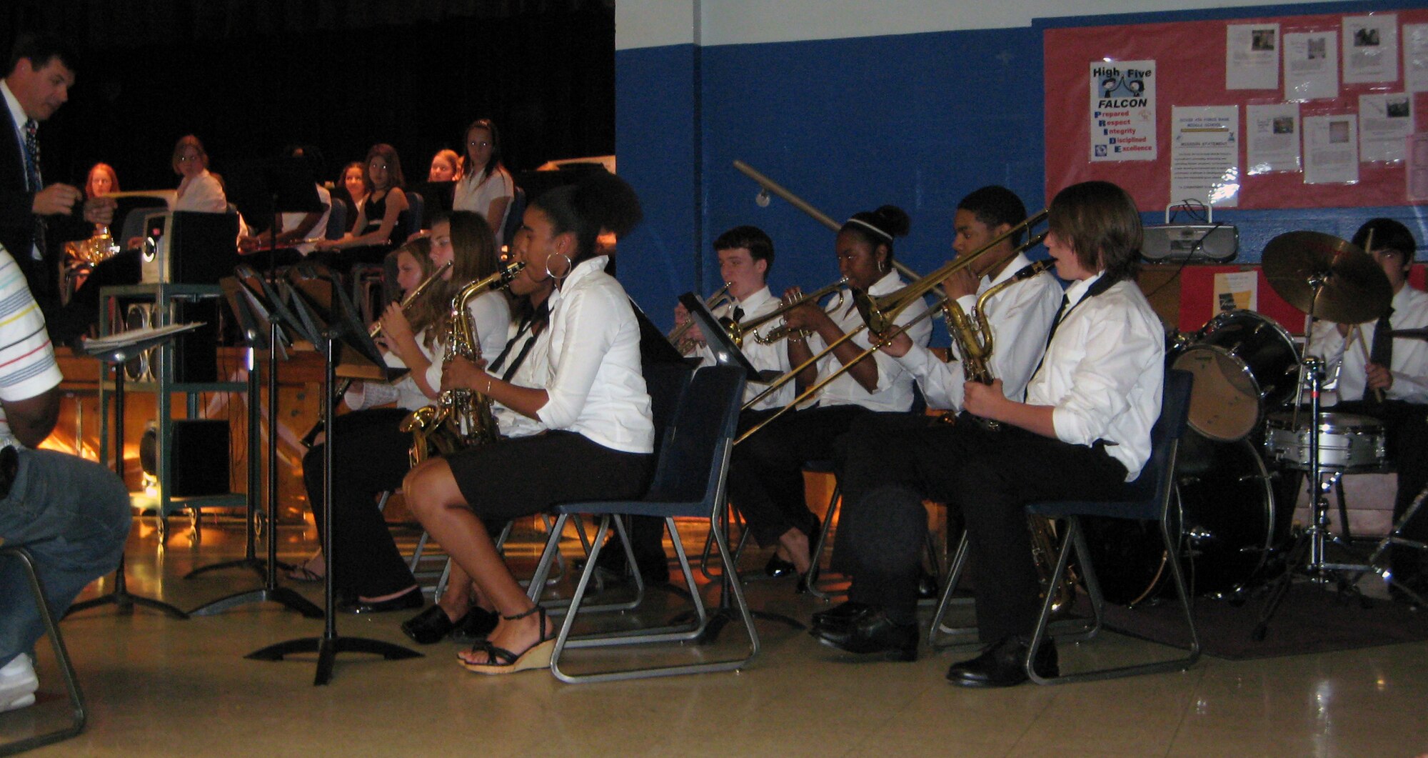 Air Base Middle School eight graders perform during the school?s Spring Concert at Dover Air Force Base May 12. The musicians were Jessica Ringer (flute), Dahana Stemrich (clarinet), Breahna Pierce and Ben Morris (trumpet), Alvin Griffin (trombone), A?Neisha Griffin (alto sax), Nick Brown (baritone sax), and David Camarillo playing the drum set. (U.S. Air Force photo by Tech. Sgt. Kevin Wallace)