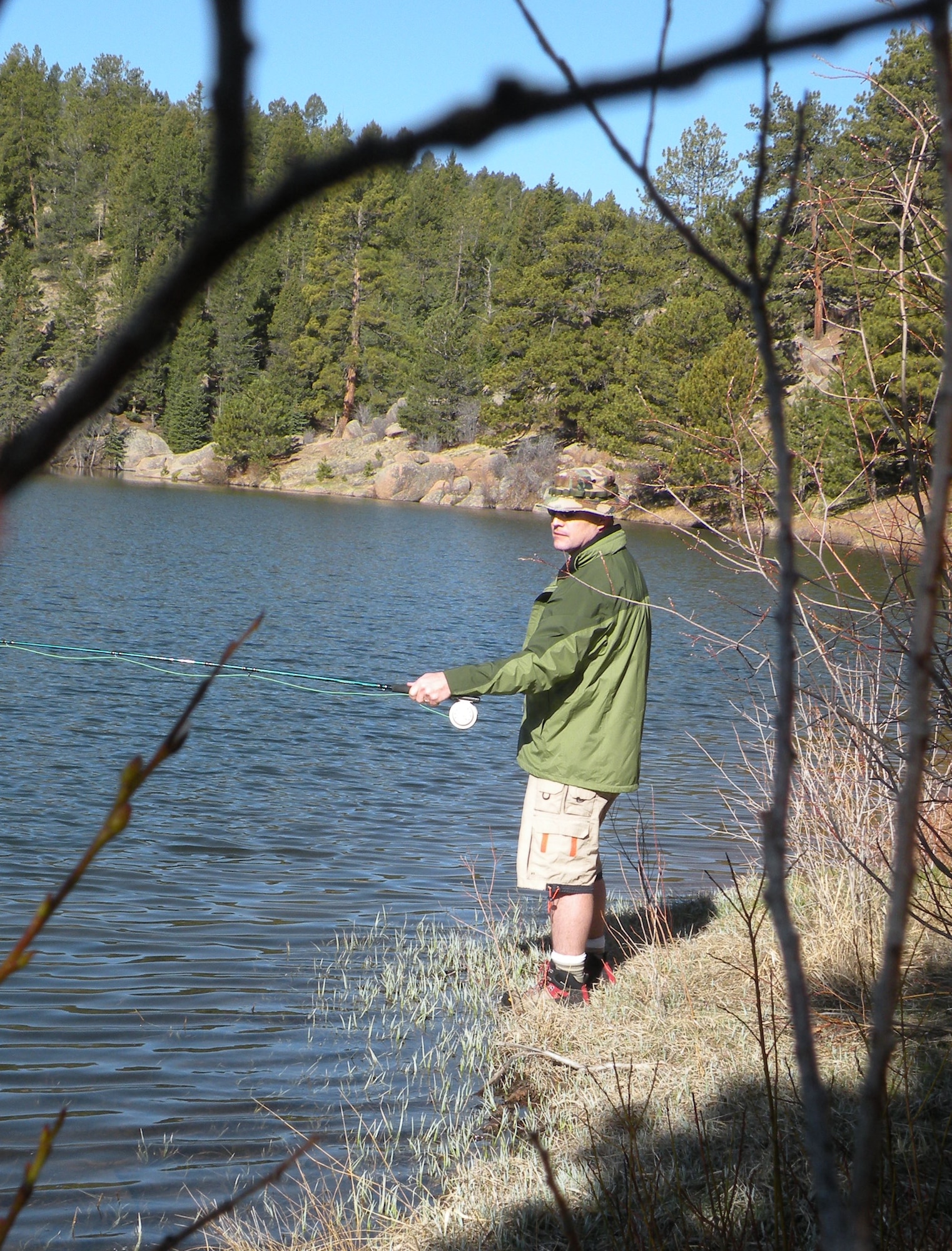 FARISH RECREATION AREA, Colo. -- Lt. Col. Eric Dorminey, 22nd Space Operations Squadron spends some time fly fishing in Stanley Canyon Reservoir. Colonel Dorminey and about 30 other current and incoming 50th Space Wing commander's took part in a two-day Commander's Conference. The event began with a hike through Stanley Canyon to Farish Recreation area May 7, 2009. The conference focused on leadership and team building. (U.S. Air Force photo/Master Sgt. Martie Moore)                                