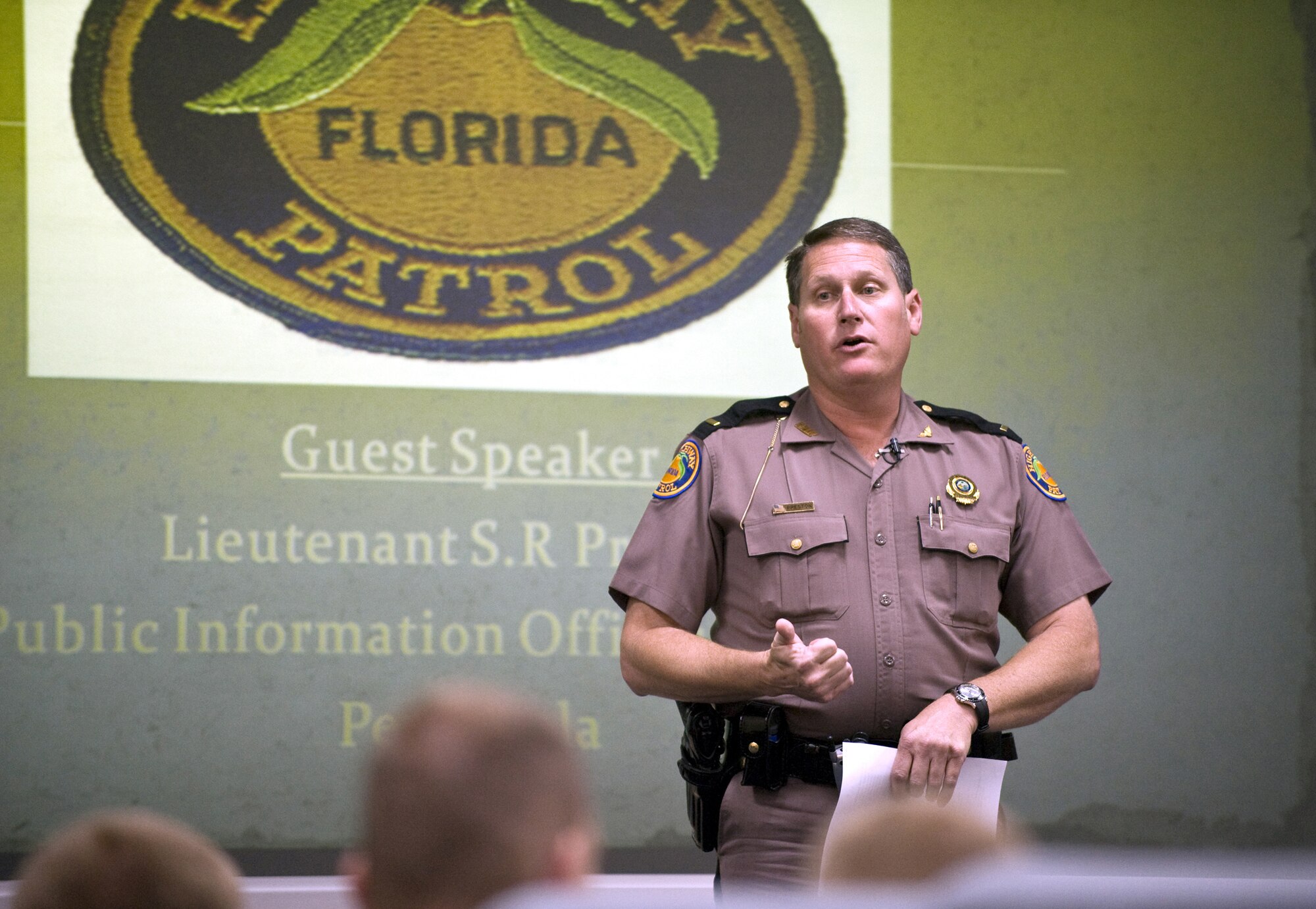 EGLIN AIR FORCE BASE, Fla. - State Trooper Lt. S.R. Preston speaks to Airmen about road safety during the summer months. He was one of the local subject matter experts speaking at the kick off of the 101 Critical Days of Summer safety campaign May 12 at the Eglin Conference Center. (U.S. Air Force photo/Craig McDonnell)
