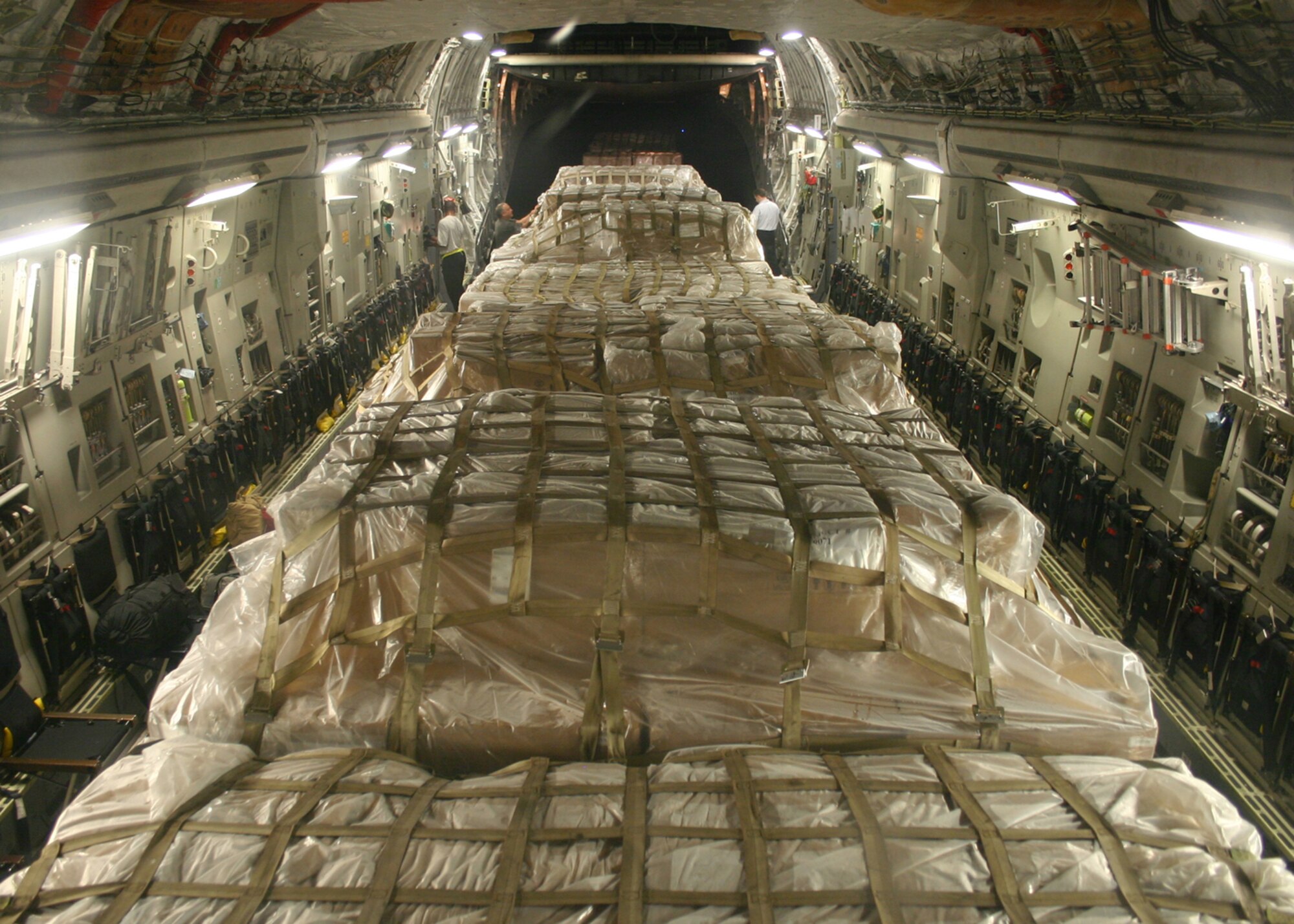 CHARLESTON AIR FORCE BASE, S.C. – Palettes of personal protective kits sit ready for delivery aboard a U.S. Air Force C-17 Globemaster III, May 8. The kits are part of a U.S. Agency for International Development shipment to Haiti, Guatemala, Honduras, El Salvador, Nicaragua and Belize to help these nations prepare for a potential outbreak of the H1N1 influenza virus. (Photo by Raymond Sarracino, U.S. Southern Command Public Affairs)
