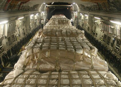 CHARLESTON AIR FORCE BASE, S.C. – Palettes of personal protective kits sit ready for delivery aboard a U.S. Air Force C-17 Globemaster III, May 8. The kits are part of a U.S. Agency for International Development shipment to Haiti, Guatemala, Honduras, El Salvador, Nicaragua and Belize to help these nations prepare for a potential outbreak of the H1N1 influenza virus. (Photo by Raymond Sarracino, U.S. Southern Command Public Affairs)
