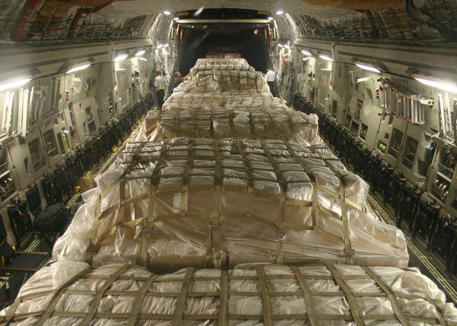 CHARLESTON AIR FORCE BASE, S.C. – Palettes of personal protective kits sit ready for delivery aboard a U.S. Air Force C-17 Globemaster III, May 8. The kits are part of a U.S. Agency for International Development shipment to Haiti, Guatemala, Honduras, El Salvador, Nicaragua and Belize to help these nations prepare for a potential outbreak of the H1N1 influenza virus. (Photo by Raymond Sarracino, U.S. Southern Command Public Affairs)
