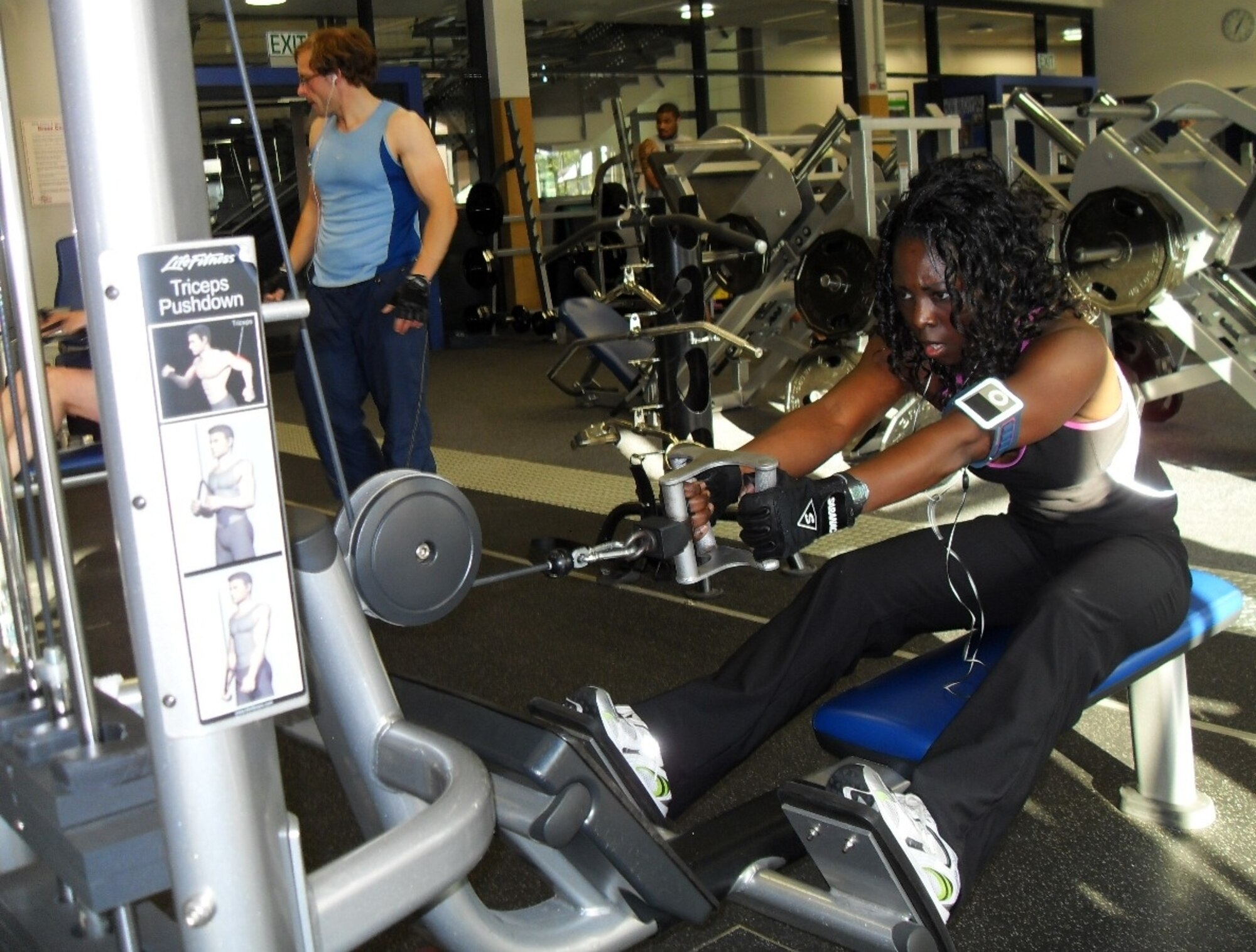 Capt. Charlotta Blalock, aide to the commander of U.S. Air Forces in Europe, works out at the Southside Fitness Center, Ramstein Air Base, Germany. (U.S. Air Force photo/Chief Master Sgt. Matt Proietti)
