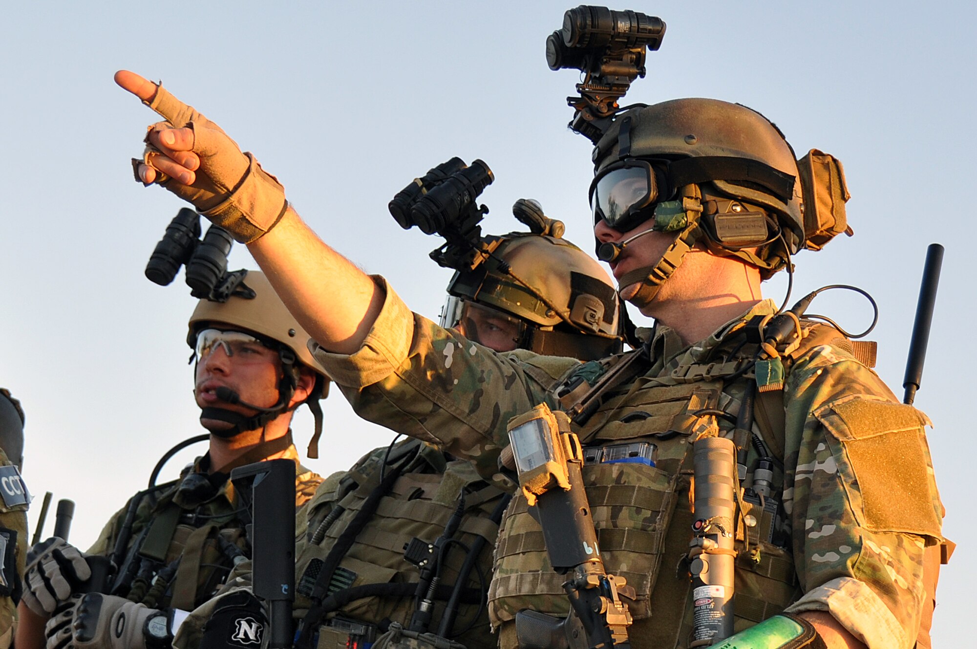 Air National Guard combat controllers plan an exercise to help the Air National Guard/Air Force Reserve Test Center (AATC) test the Situational Awareness Data Link, or SADL, May 7. The tactical data link commonly used for close air support promises to benefit mobility operations as well. (National Guard photo by Master Sgt. Mike R. Smith)