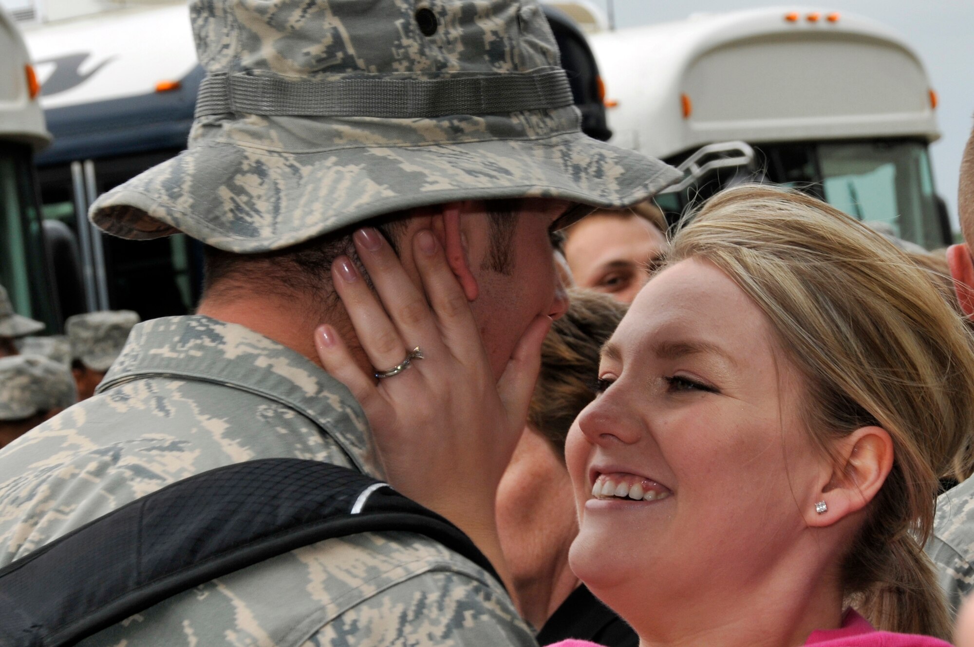 ROYAL AIR FORCE LAKENHEATH, England -- Sarah Garner welcomes home her husband Senior Airman Richard Garner, 48th Munitions Squadron, May 13, 2009. Over 250 Airmen returned from a four month deployment to Afghanistan in support of Operation Enduring Freedom. (U.S. Air Force photo by Airman 1st Class Perry Aston) 