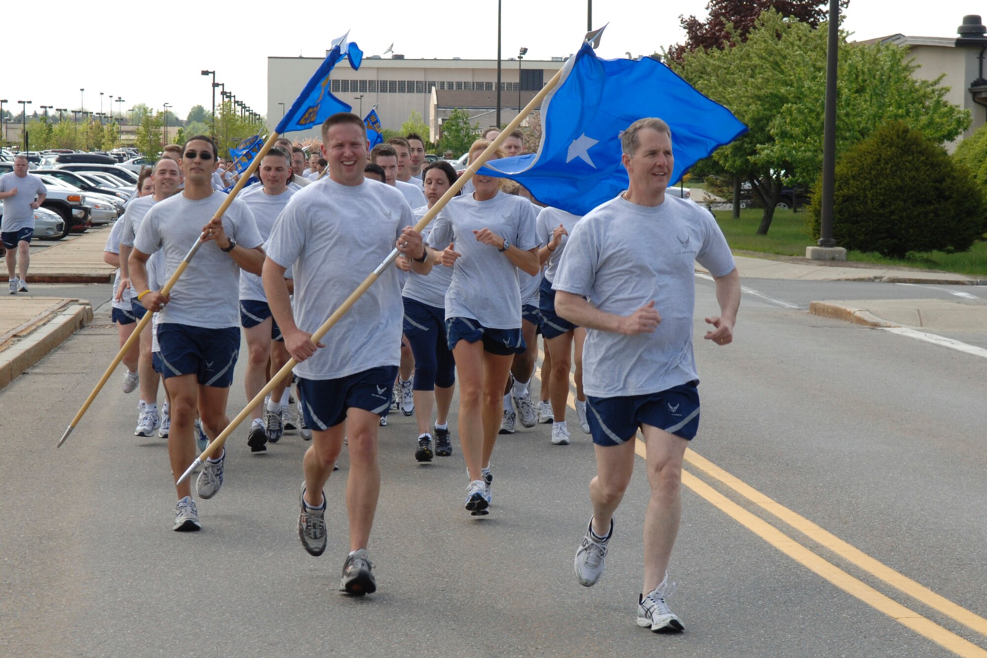 HANSCOM AIR FORCE BASE, Mass. –Lt. Gen. Ted Bowlds, Electronic Systems Center commander, leads a formation run to officially kick off Hanscom’s Olympic games on May 11. The Olympics will take place through May 21, and will feature competition between the base's five wings, Air Force Research Laboratory, Electronic Systems Center staff and joint service personnel.  (U.S. Air Force photo by Rick Berry)