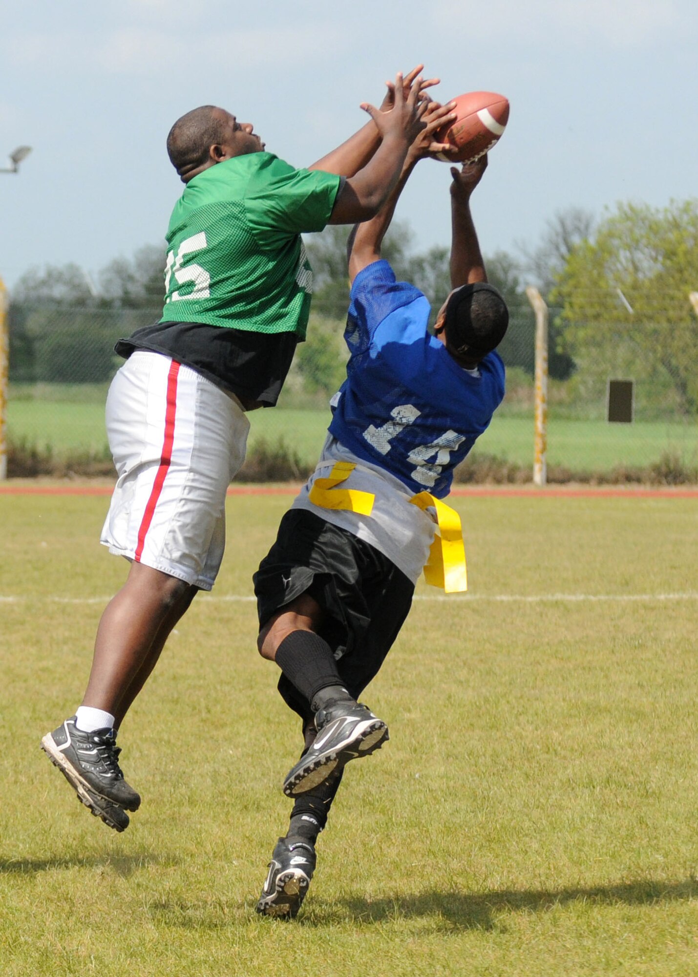 Senior Airman Chris Murray, 100th Security Forces Squadron, intercepts a pass to Staff Sgt. Evis Mcgee, 48th Security Forces Squadron, RAF Lakenheath, during a flag football game held between the two bases at Heritage Park May 12, 2009, RAF Mildenhall, England. The 100th SFS strolled to victory with a blowout win with the final score of 56-0. The game was held as part of “Police Week” events in which is to pay tribute to fallen officers across the nation. (U.S. Air Force photo by Staff Sgt. Jerry Fleshman)