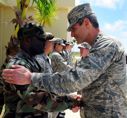 ANDERSEN AIR FORCE BASE, Guam - Gen. Norton A. Schwartz, chief of staff of the Air Force, expresses his appreciation to Staff Sgt. Dante Davis, 734th Air Mobility Squadron, for his contributions to the Air Force during his visit May 9. Staff Sgt Davis is a Hydraulics System Craftsman with the 734th AMS.  The visit marked General Schwartz's first trip to Andersen AFB since his appointment as the Air Force chief of staff. (U.S. Air Force photo by Airman 1st Class Courtney Witt)

