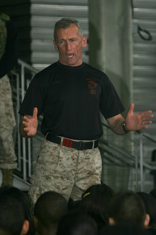 - Retired Marine LtCol. Joseph Shusko, Director of the Marine Corps’ Martial Arts Center of Excellence (MACE) talks with a group of 800 cadets from the Junior Reserve Officers’ Training Corps during a demonstration of martial arts maneuvers by members of