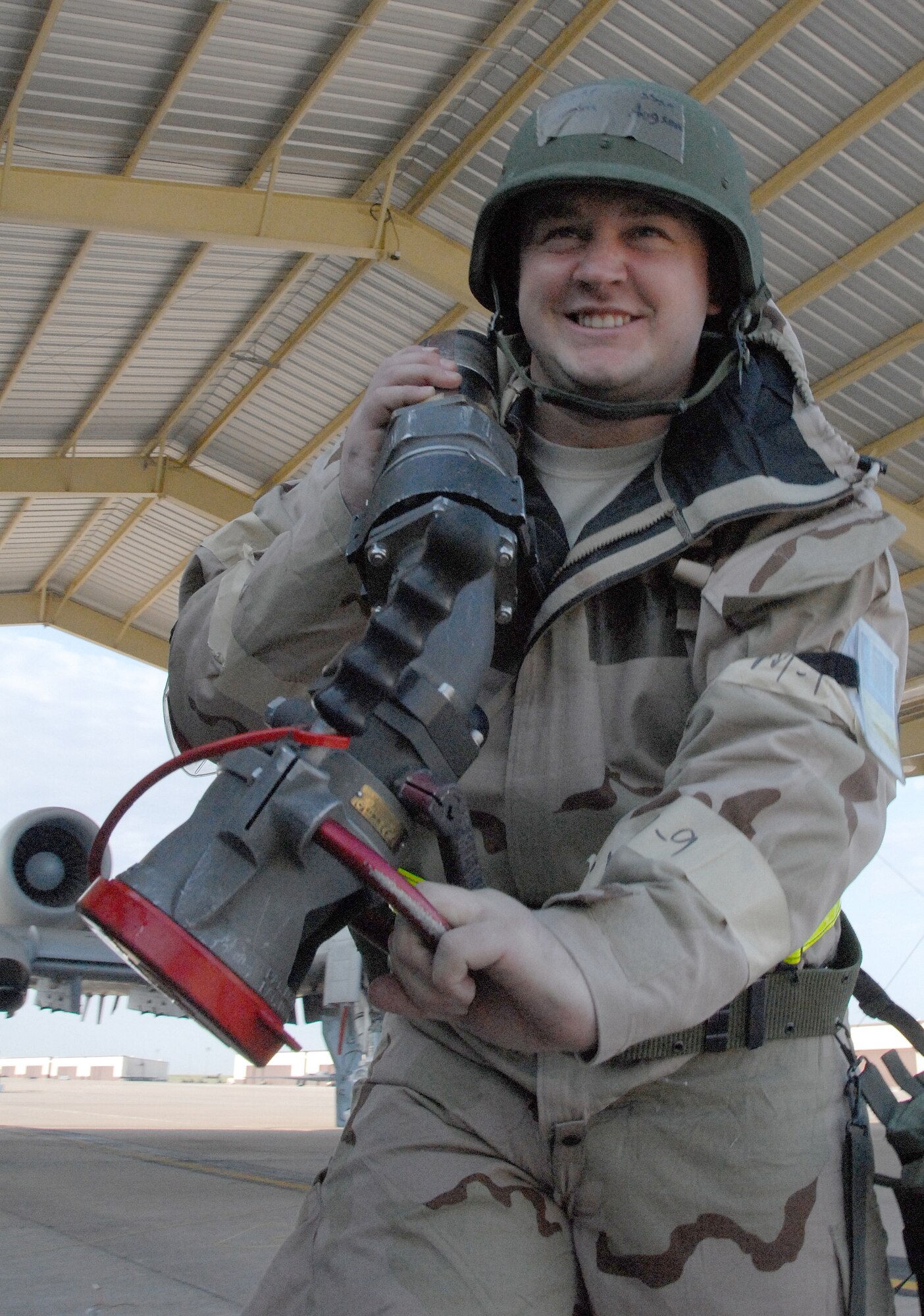 Staff Sgt. Jordan Aggson, 442nd Logistics Readiness Squadron, drags a refueling hose back to his tanker truck after servicing an A-10 Thunderbolt II during an Operational Readiness Exercise at Whiteman Air Force Base, Mo., May 14, 2009. The 442nd LRS is part of the 442nd Fighter Wing, an Air Force Reserve Command A-10 unit. (US Air Force photo/Master Sgt. Bill Huntington)