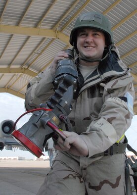 Staff Sgt. Jordan Aggson, 442nd Logistics Readiness Squadron, drags a refueling hose back to his tanker truck after servicing an A-10 Thunderbolt II during an Operational Readiness Exercise at Whiteman Air Force Base, Mo., May 14, 2009. The 442nd LRS is part of the 442nd Fighter Wing, an Air Force Reserve Command A-10 unit. (US Air Force photo/Master Sgt. Bill Huntington)