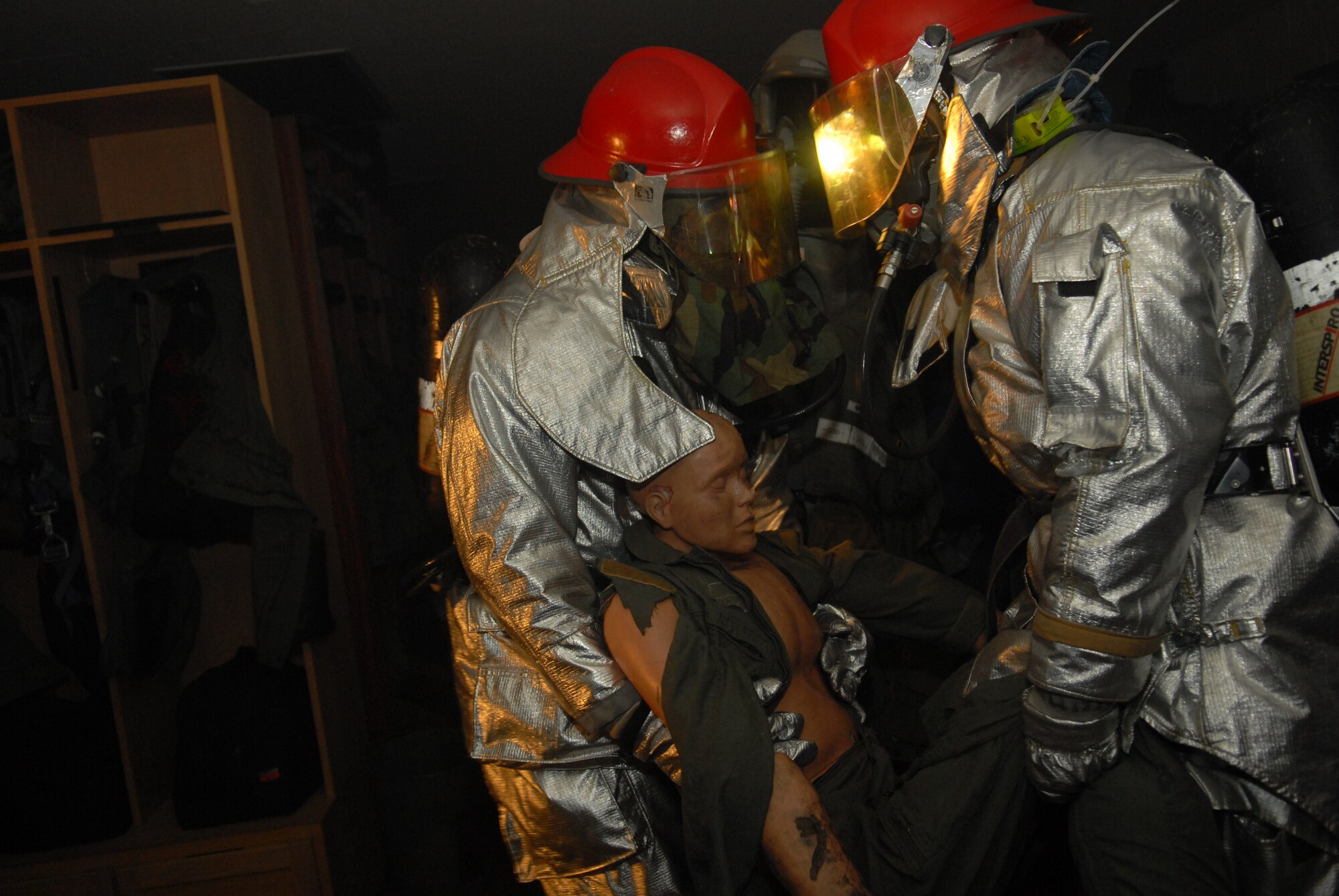 Firefighters from the 18th Civil Engineer Squadron respond to a simulated fire from a mortar attack during Beverly High 09-2 Local Operational Readiness Exercise at Kadena Air Base, May 14. The LORE tests base personnel on their combat readiness for real world emergency/combat events.
(U.S. Air Force photo/Tech. Sgt. Angelique Perez) 