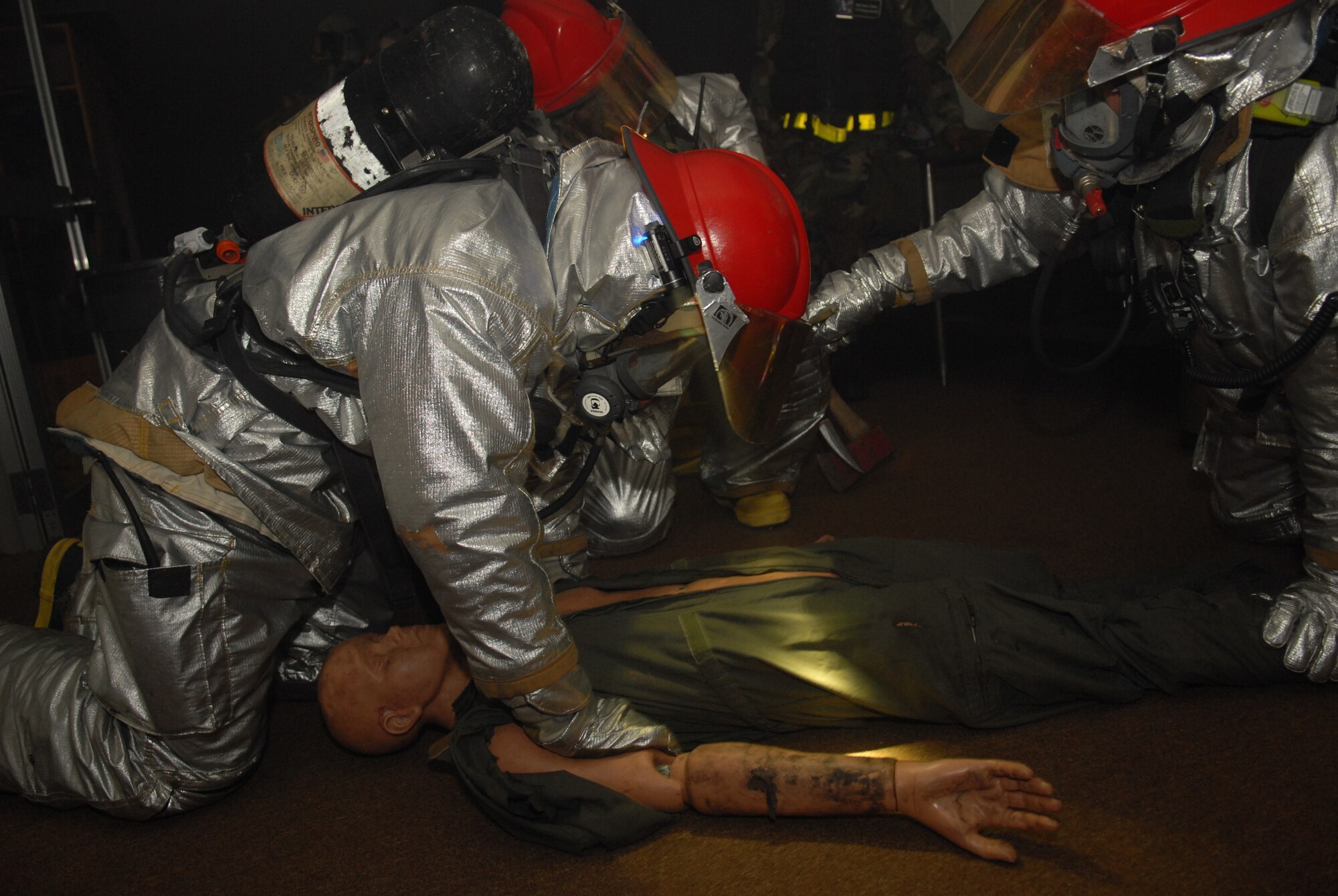 Firefighters from the 18th Civil Engineer Squadron respond to a simulated fire from a mortar attack during Beverly High 09-2 Local Operational Readiness Exercise at Kadena Air Base, May 14. The LORE tests base personnel on their combat readiness for real world emergency/combat events.
(U.S. Air Force photo/Tech. Sgt. Angelique Perez) 