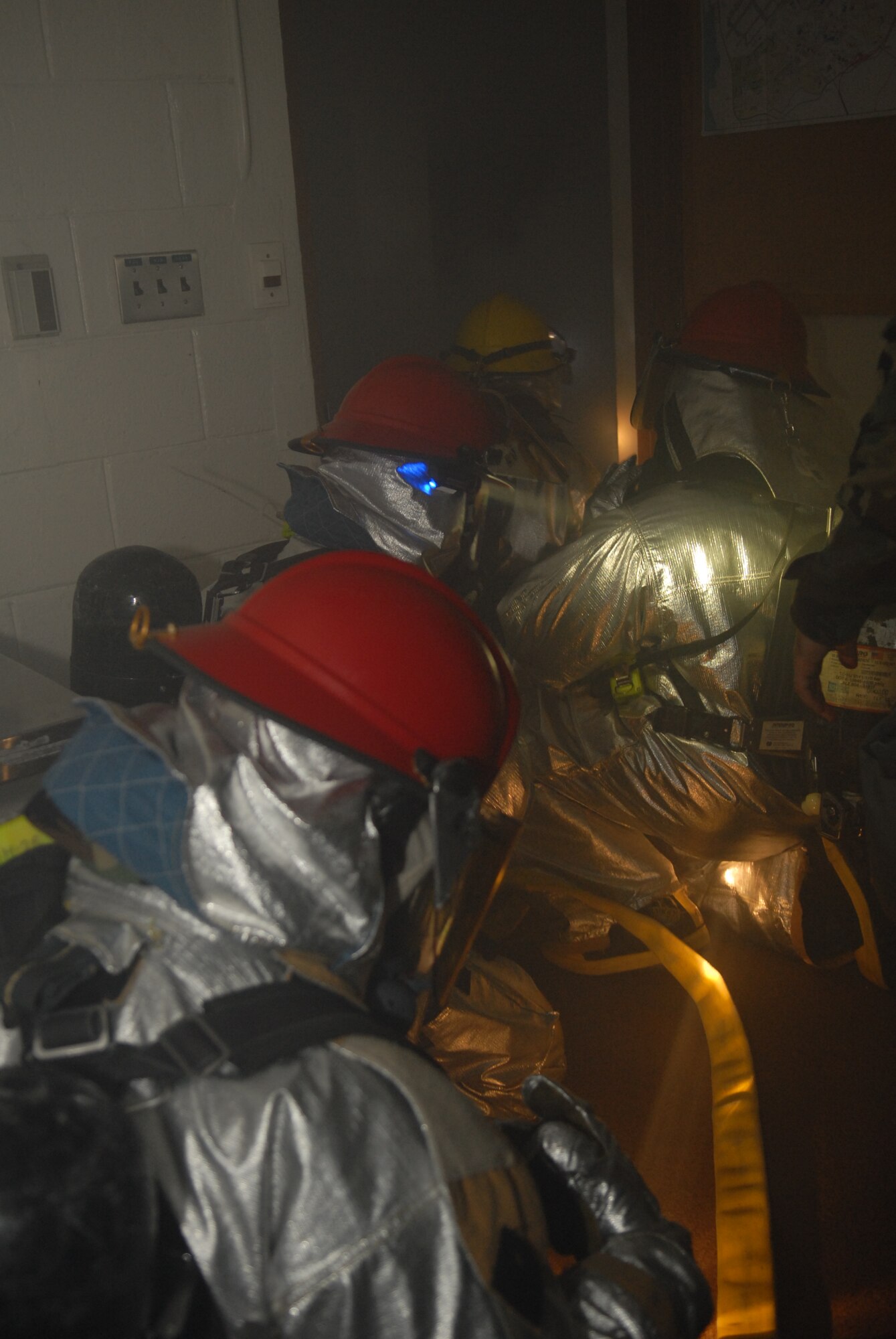 Firefighters from the 18th Civil Engineer Squadron respond to a simulated fire from a mortar attack during Beverly High 09-2 Local Operational Readiness Exercise at Kadena Air Base, May 14. The LORE tests base personnel on their combat readiness for real world emergency/combat events.
(U.S. Air Force photo/Tech. Sgt. Angelique Perez) 